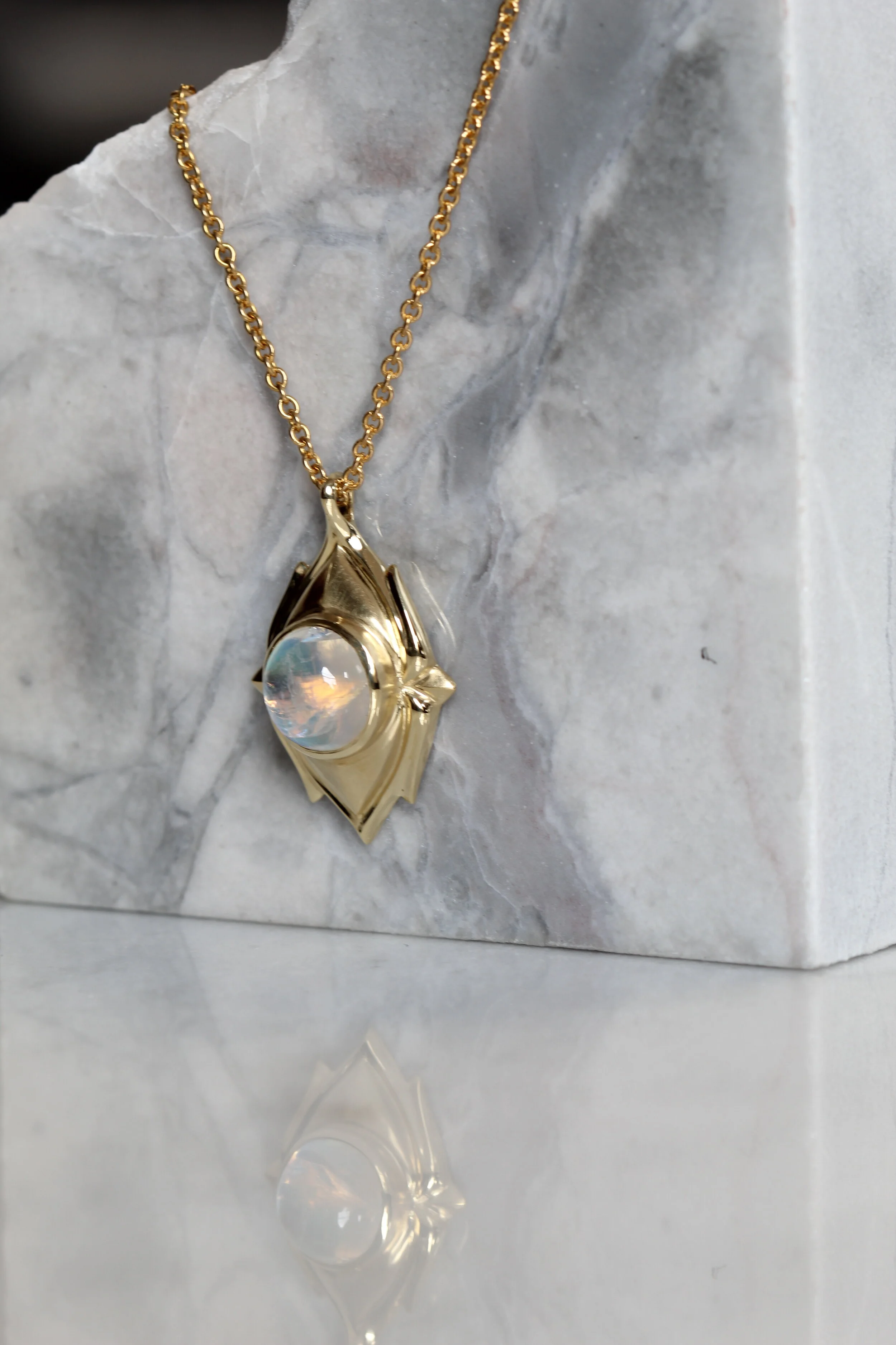 18k yellow gold and moonstone. 2021