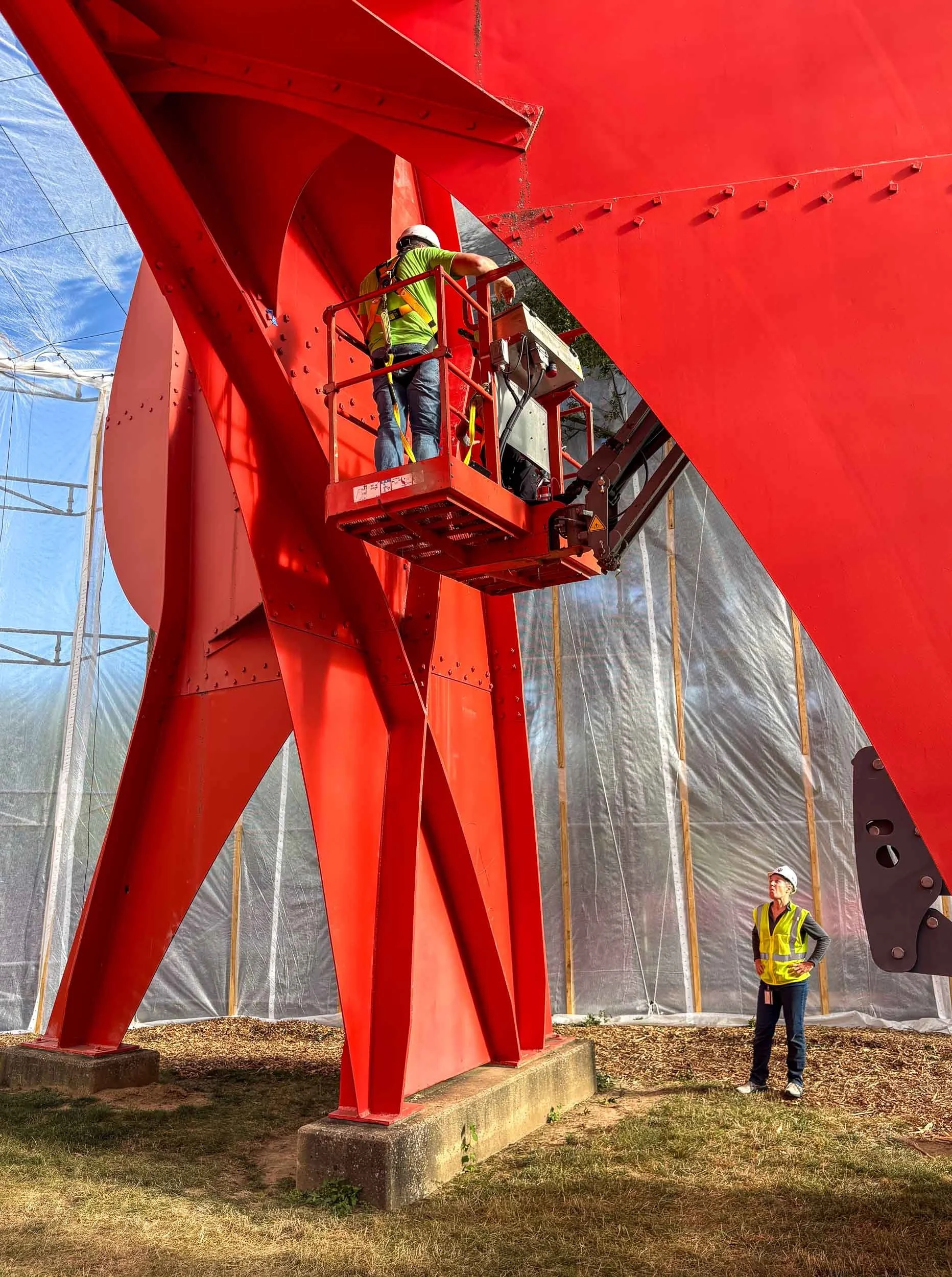 BPS, Abigail Mack, and IU stake holders accessing sculpture for areas of corrosion