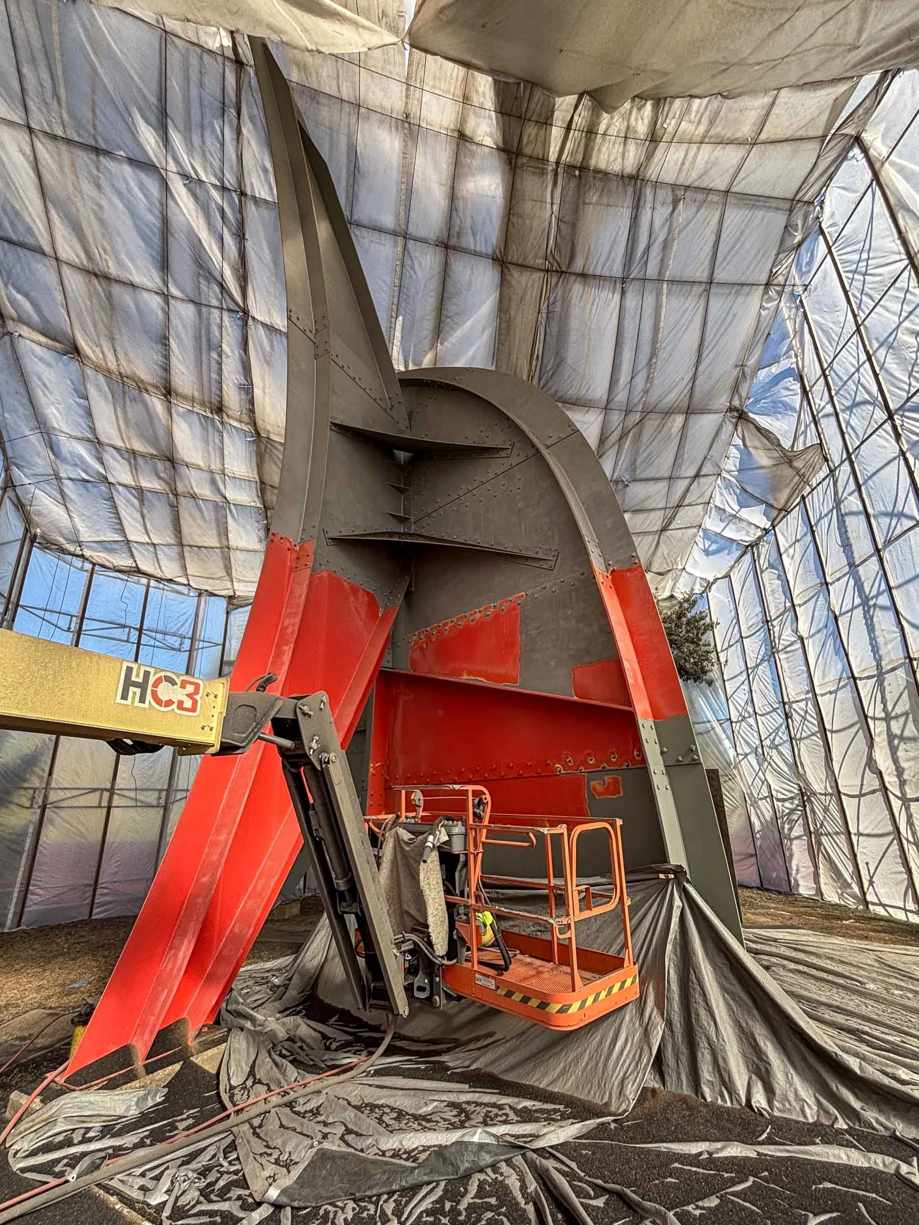 During sandblasting and coat of zinc rich primer