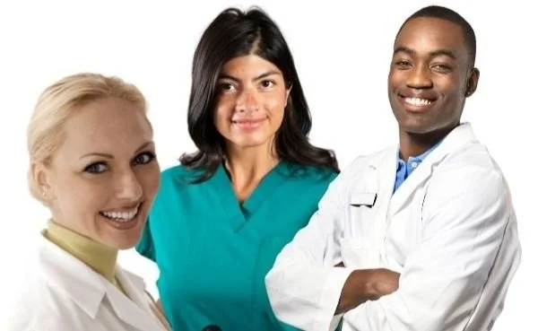 Two female and one male skincare practitioner.