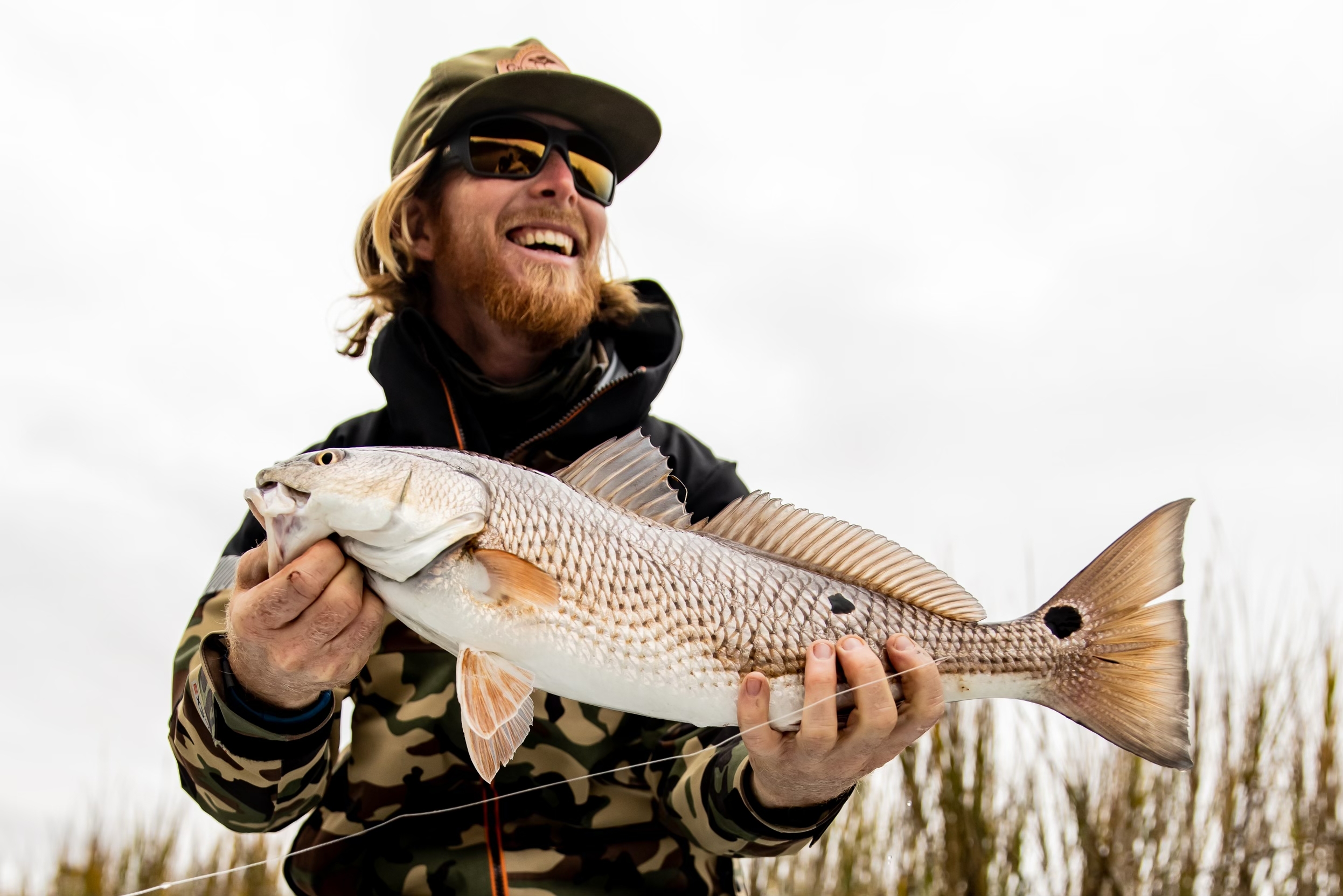 Dressing for Winter Red Fish Fishing — Green Heron Adventures