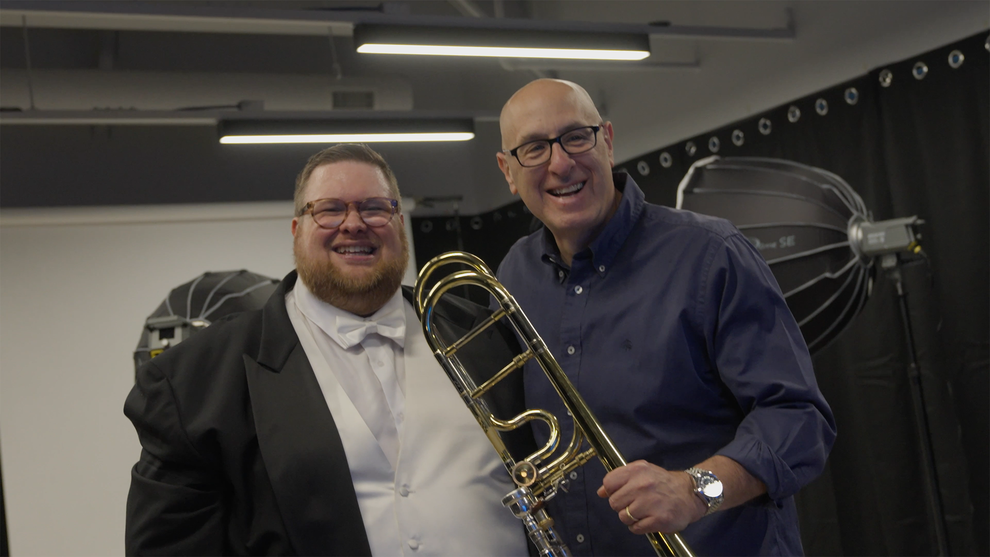 Joe Zeff, right, President of Joe Zeff Design, stands with Doug Rosenthal, Associate Principal Trombone in the Pittsburgh Symphony Orchestra, during a holographic recording session at Joe Zeff Design studios in Downtown Pittsburgh.