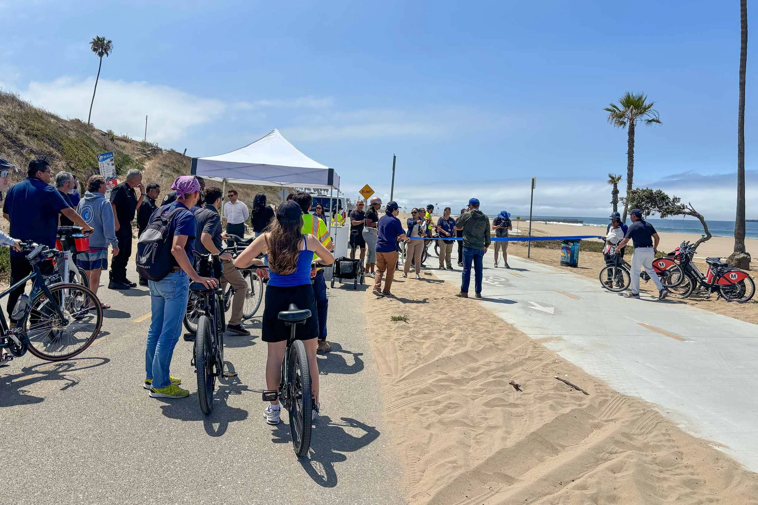 Community members, advocates, project partners, and local leaders gathered for bike path opening.