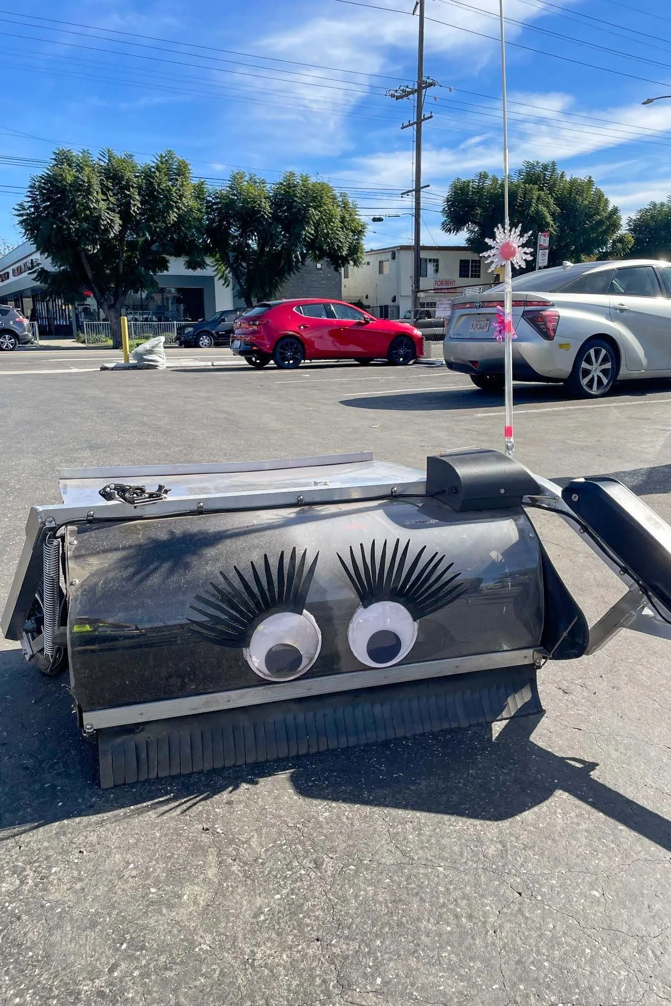 Bike lane sweeper named Sweeping Beauty that cleans a section of the Hollywood Blvd bike lanes.
