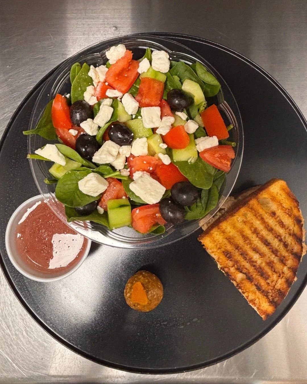 Now at @tsvault_smoothiejuicebar , the Daily Special is just $13.75, a delicious, feel-good combo that hits the spot. 🥪🥗✨

Enjoy a half panini, a small salad, and an energy bite, perfect for a quick lunch, midday pick-me-up, or healthy reset. ⚡😋 M