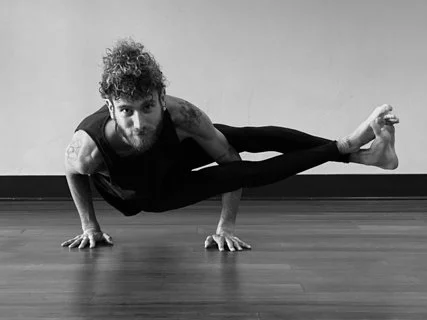 Picture of yoga instructor Blu High in a yoga pose.