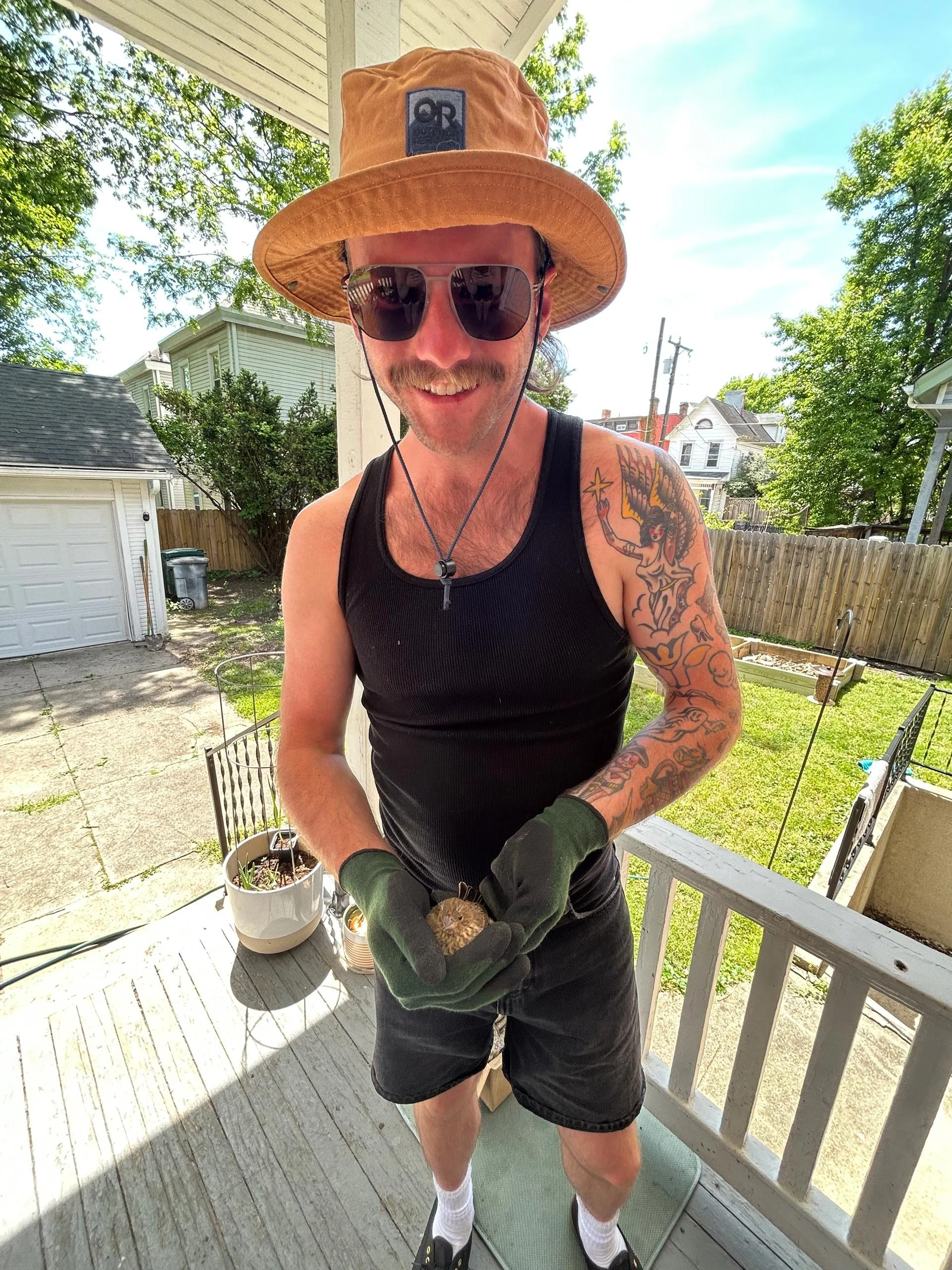 Stephen-holding-a-bird.jpg