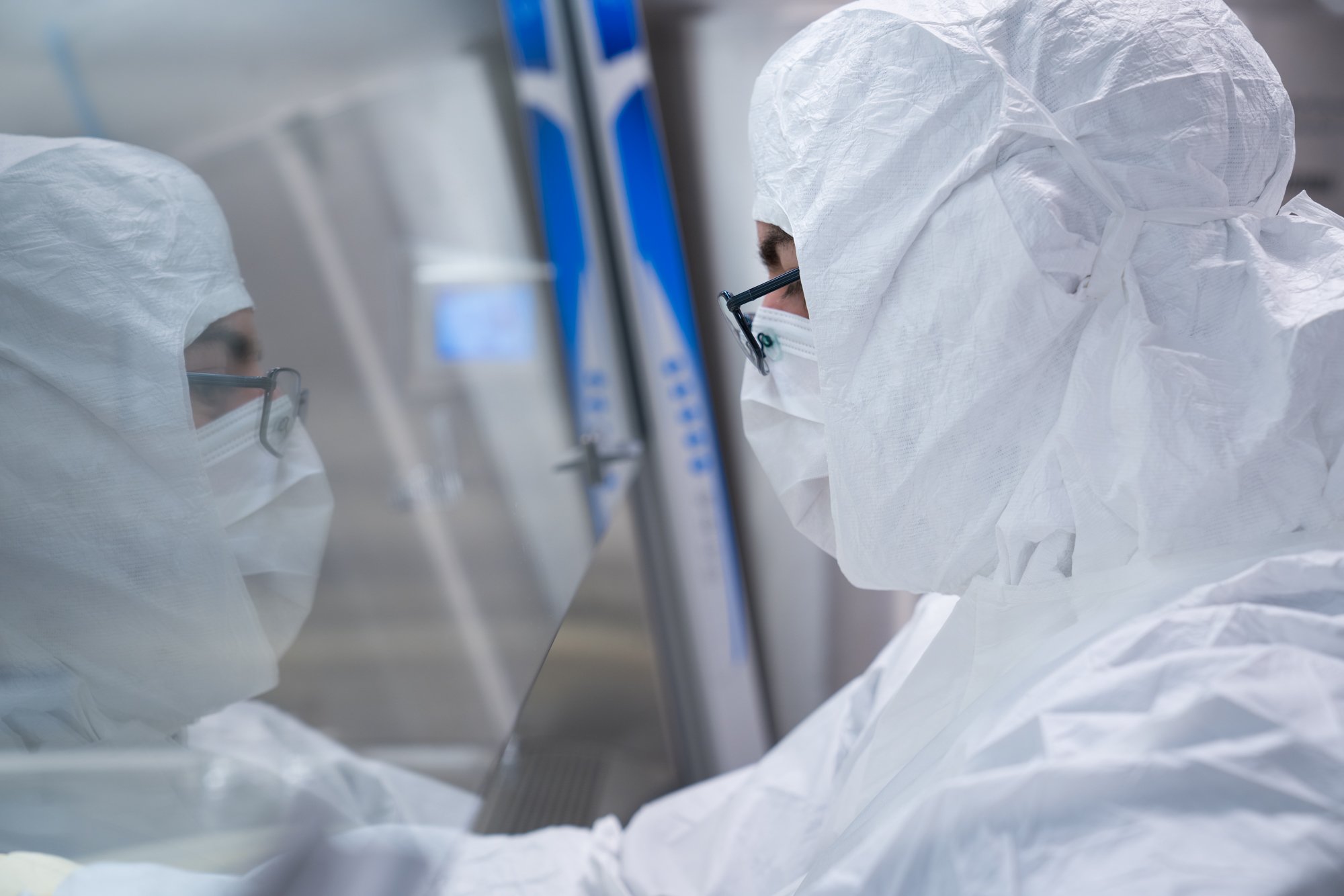 Scientist wearing protective gear working in a laboratory