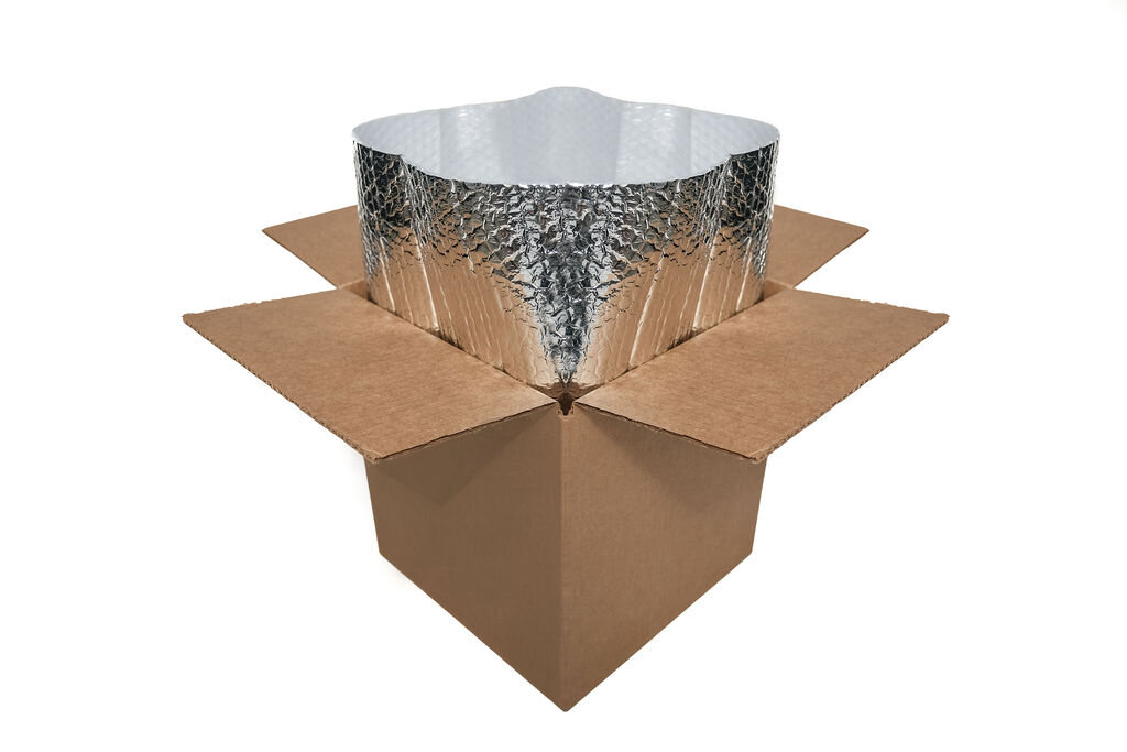 Open cardboard box with silver bubble wrap liner inside, designed for thermal insulation.