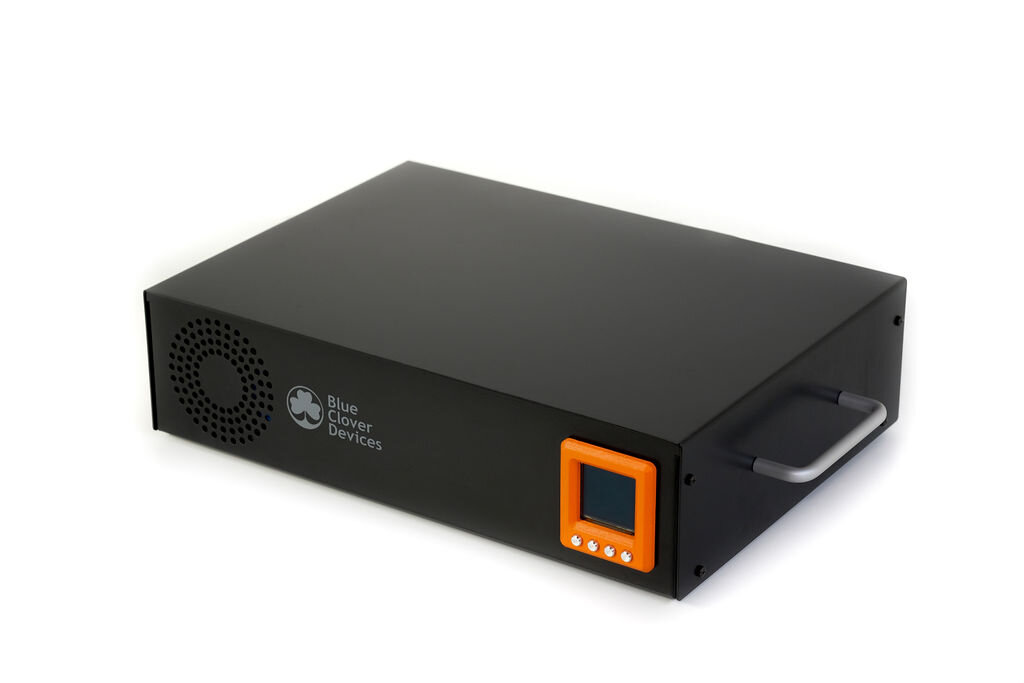 Black electronic device with a display screen and handle, labeled "Blue Clover Devices."
