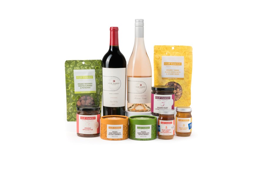 Assorted Clif Family products including wine, nuts, and spreads on display