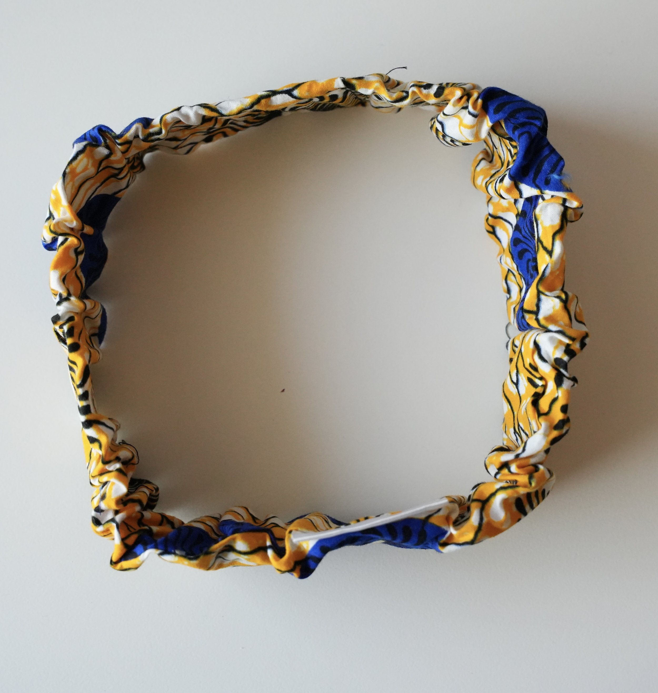Yellow with blue elastic