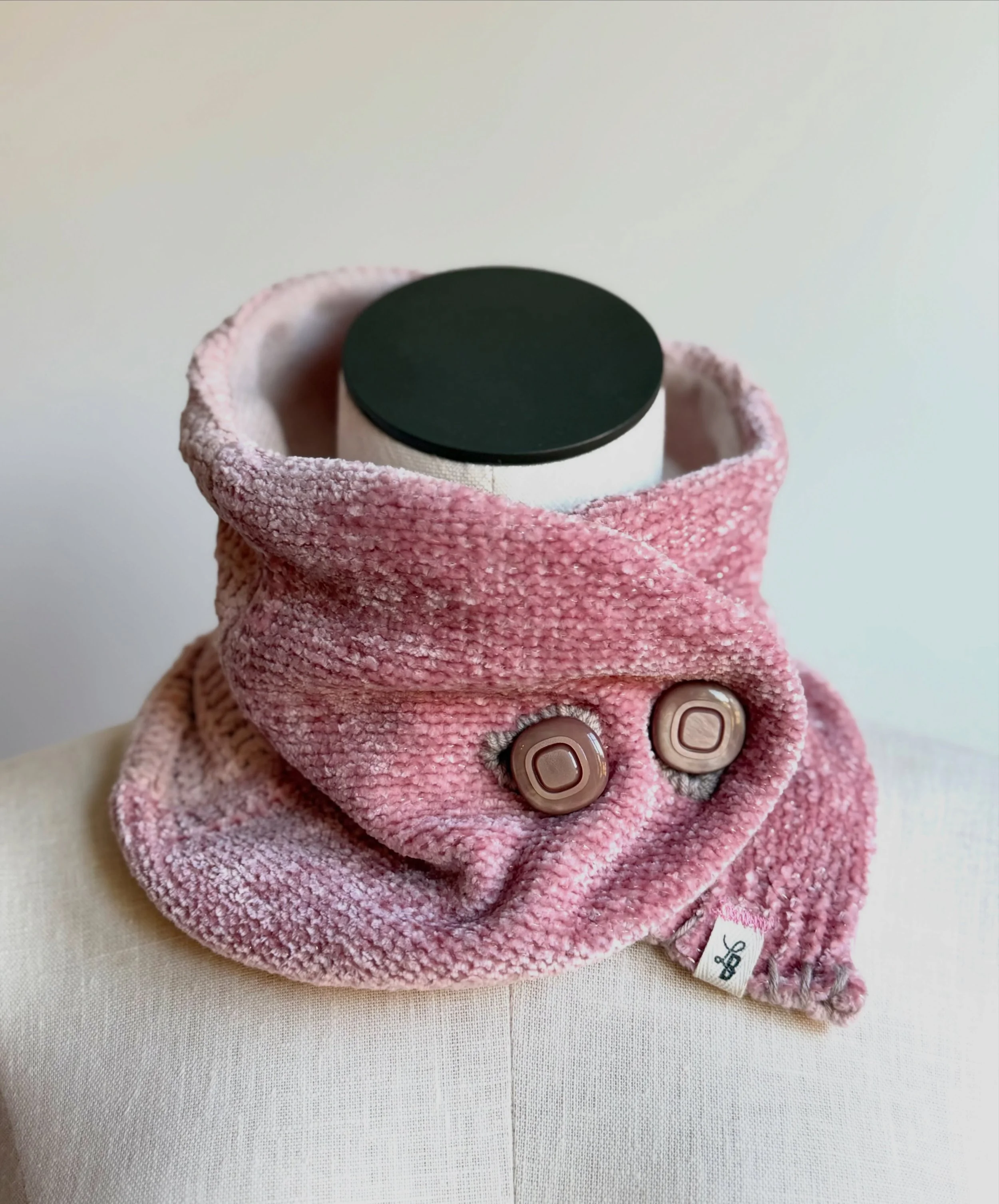 Fresh onto the LilyBUNK shelf! 🌸 Super soft, yummy, and ready to keep you cozy, this cashmere-lined Neck-Warmer brings together soft pinks from the upper sleeves of multiple sweaters. A few vintage buttons, an LB tag, and hand-finished yarn stitchin