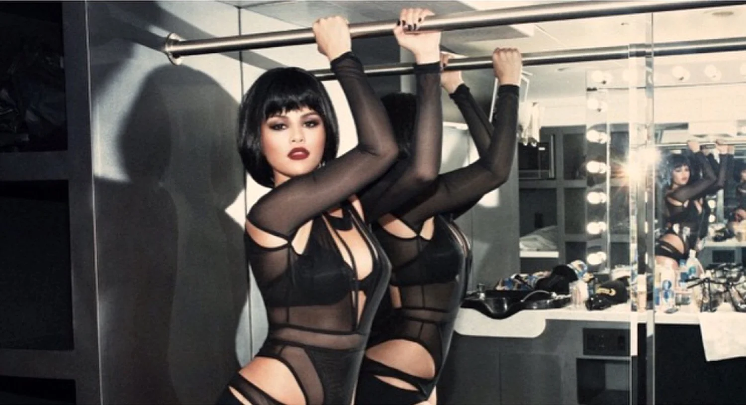 SELENA GOMEZ wearing a Bao Tranchi Bodysuit for Taylor Swift's "Bad Blood" music video. (Behind the Scenes-photo by Jake Bailey) 