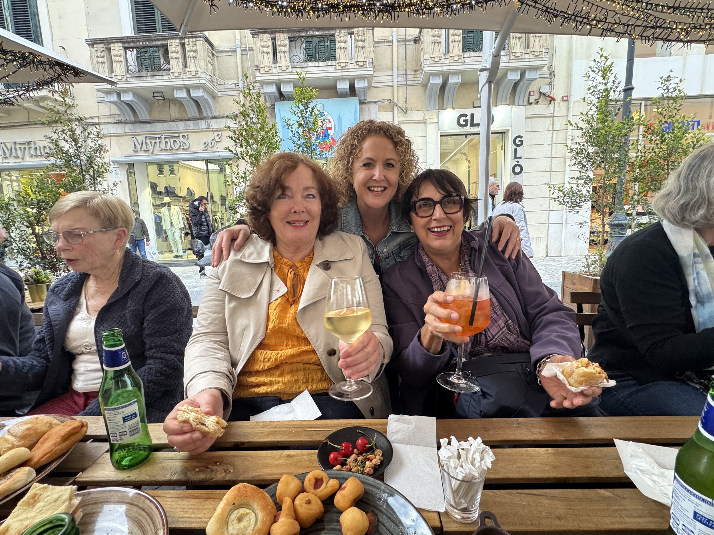 Holly and guests enjoying wine in Reggio