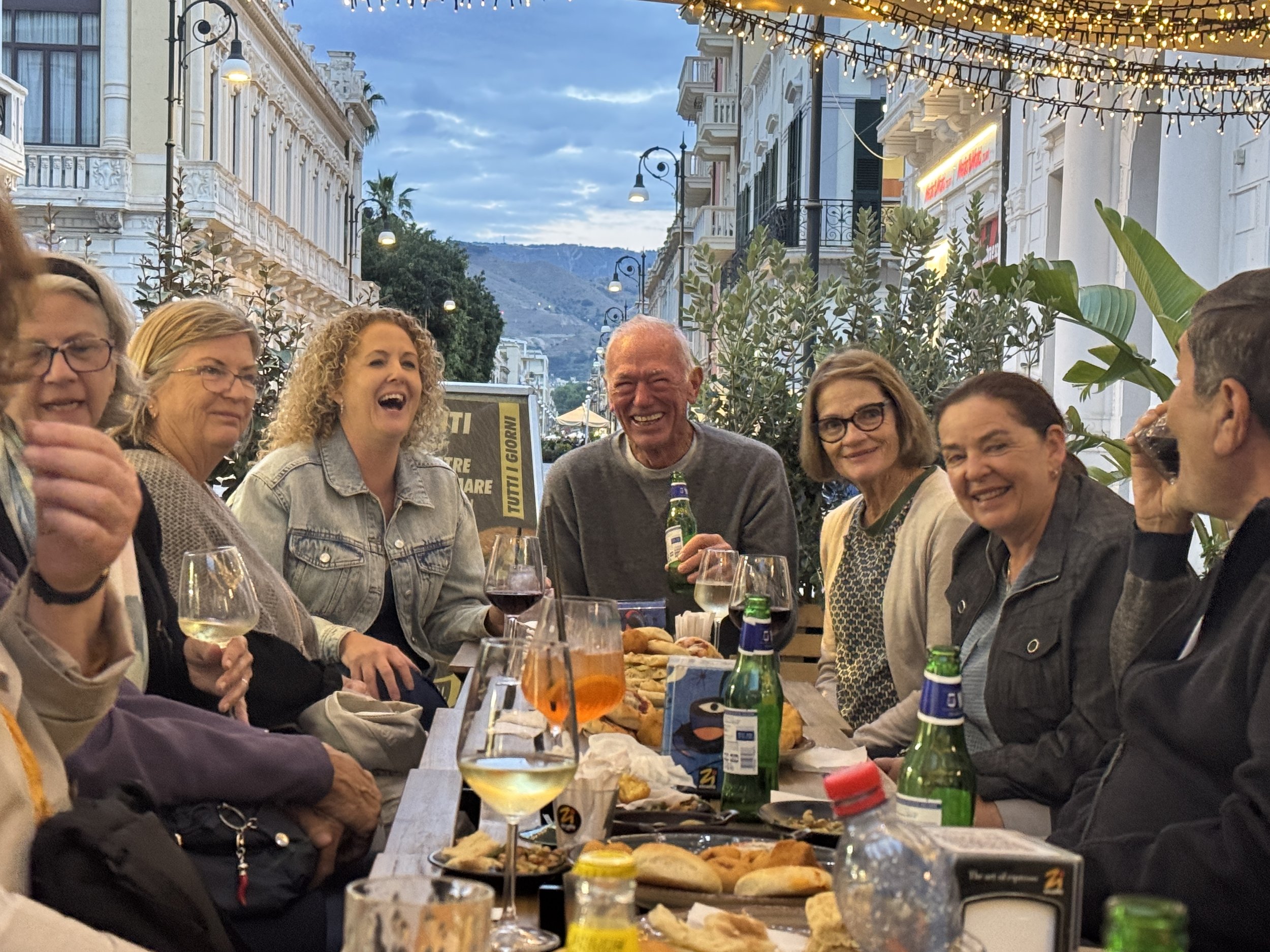 Holly and guests having dinner in Reggio