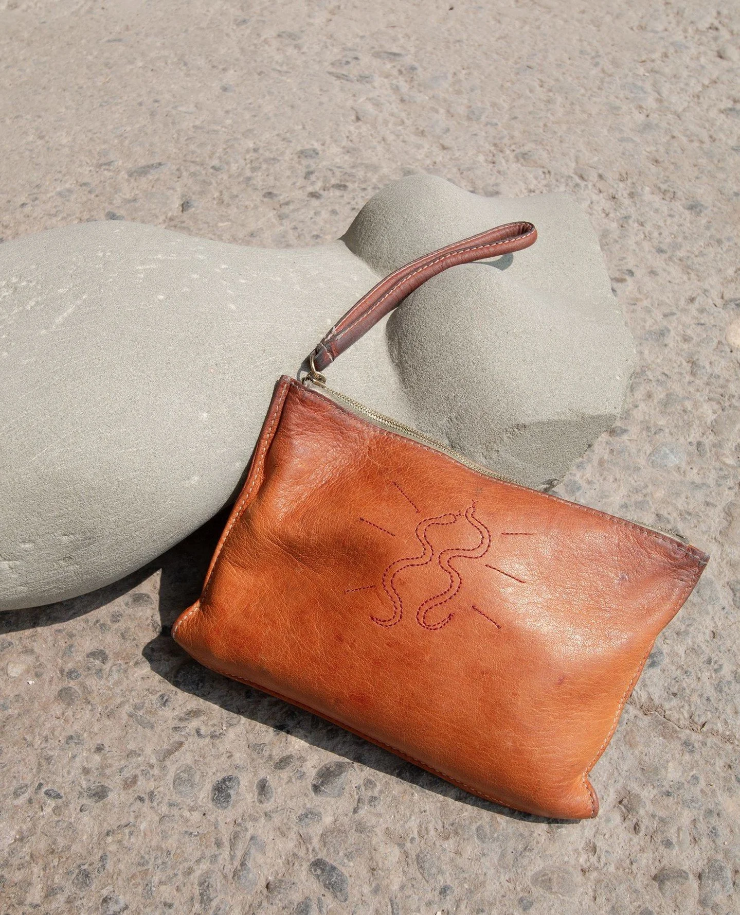 Power stitched in every detail. 🐍Originally created for the Women's Strike our MEDUSA case carries a quiet kind of strength. The serpent, a symbol of transformation, wisdom, and courage. A reminder that power doesn't always shout, someti