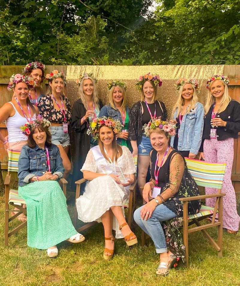 A group shot of a happy hen do party being served by Brighton-based premium cocktail experience The Cocktail Tribe