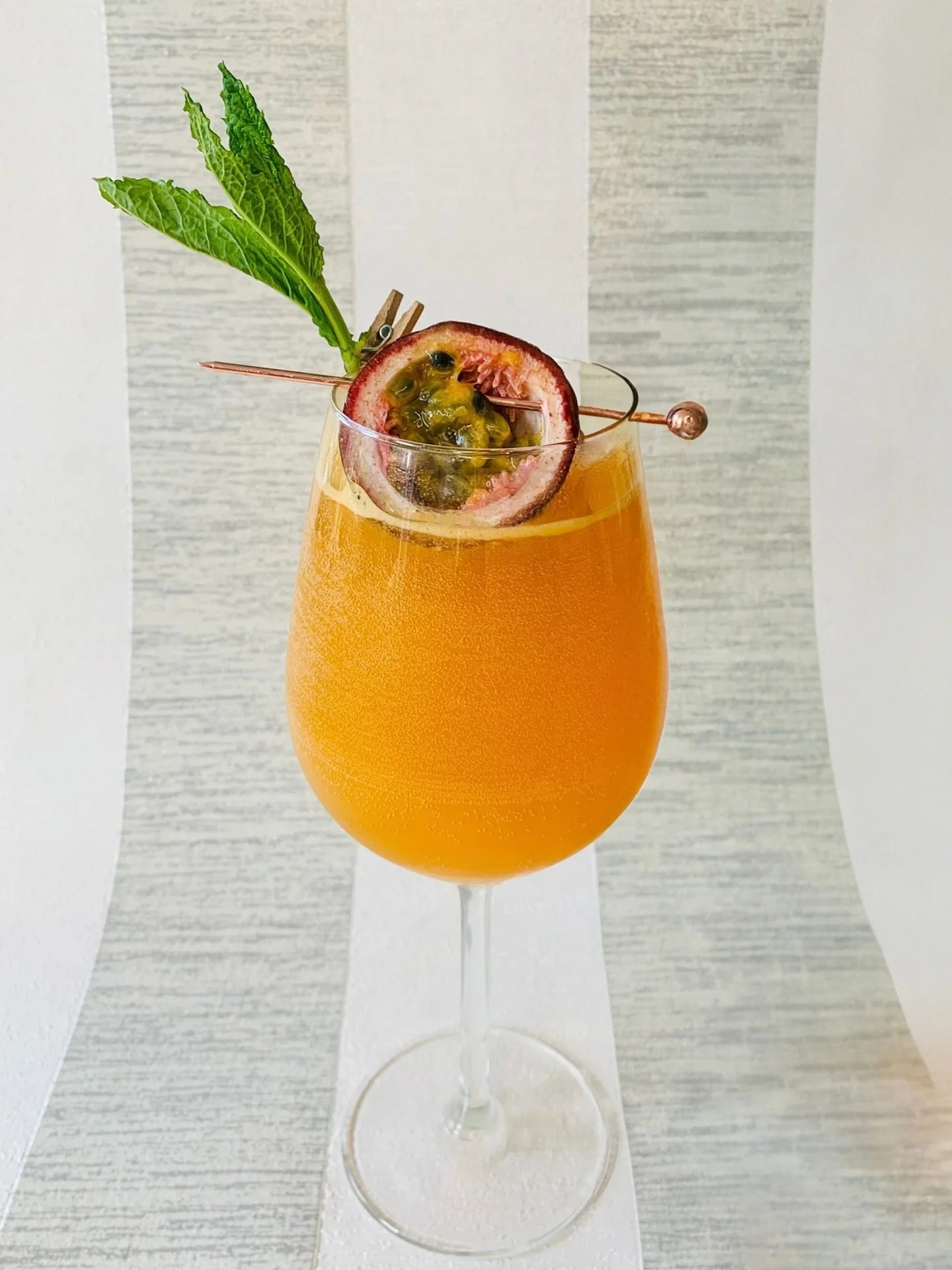 Tropical Spritz
🍹
@ketelone Vodka, @passoa, mango pur&eacute;e, simple syrup, lime juice, sicilian lemonade

Light, layered, and gone in a glance. 🤷&zwj;♀️
The kind of spritz that turns one drink into three. ☀️

&bull; Served in a wine glass

&bull