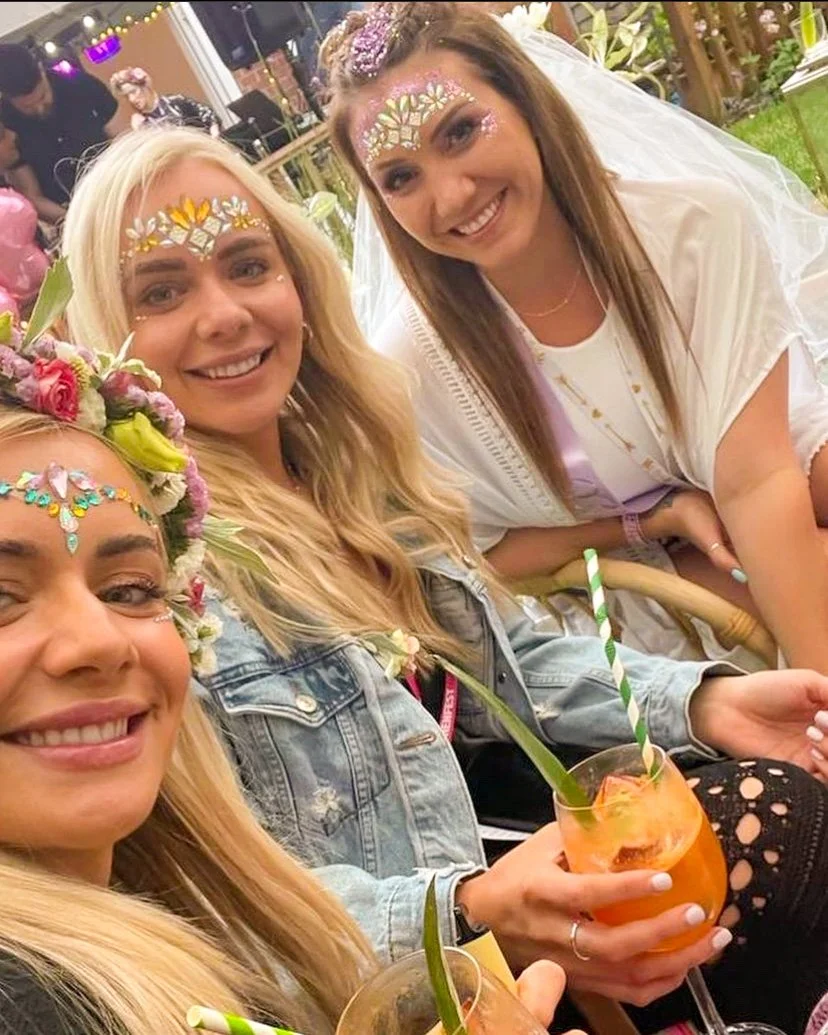 Three ladies enjoying a delicious cocktail service at a garden hen party