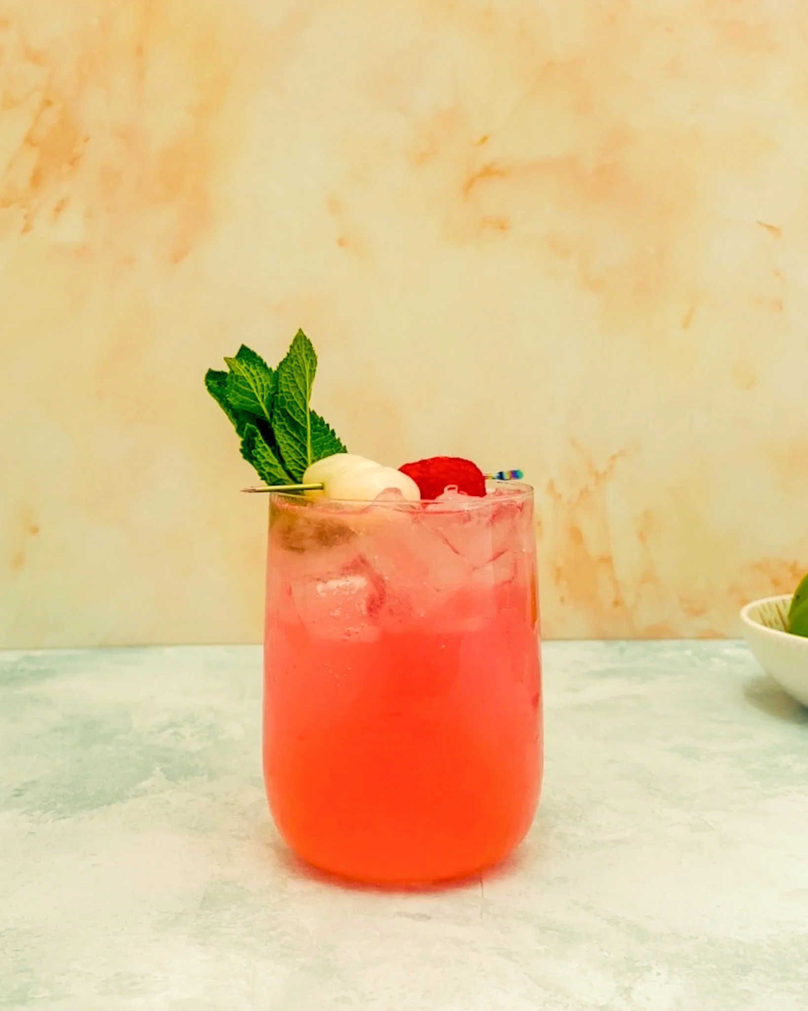 A Lychee Lush mocktail served by Brighton's leading cocktail experience provider The Cocktail Tribe