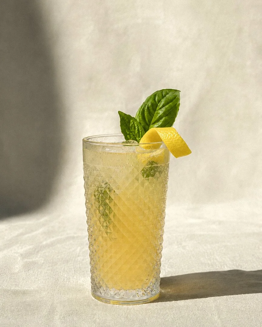 An Amalfitano cocktail set in a sophisticated linen backdrop perfect for a garden party in Lewes