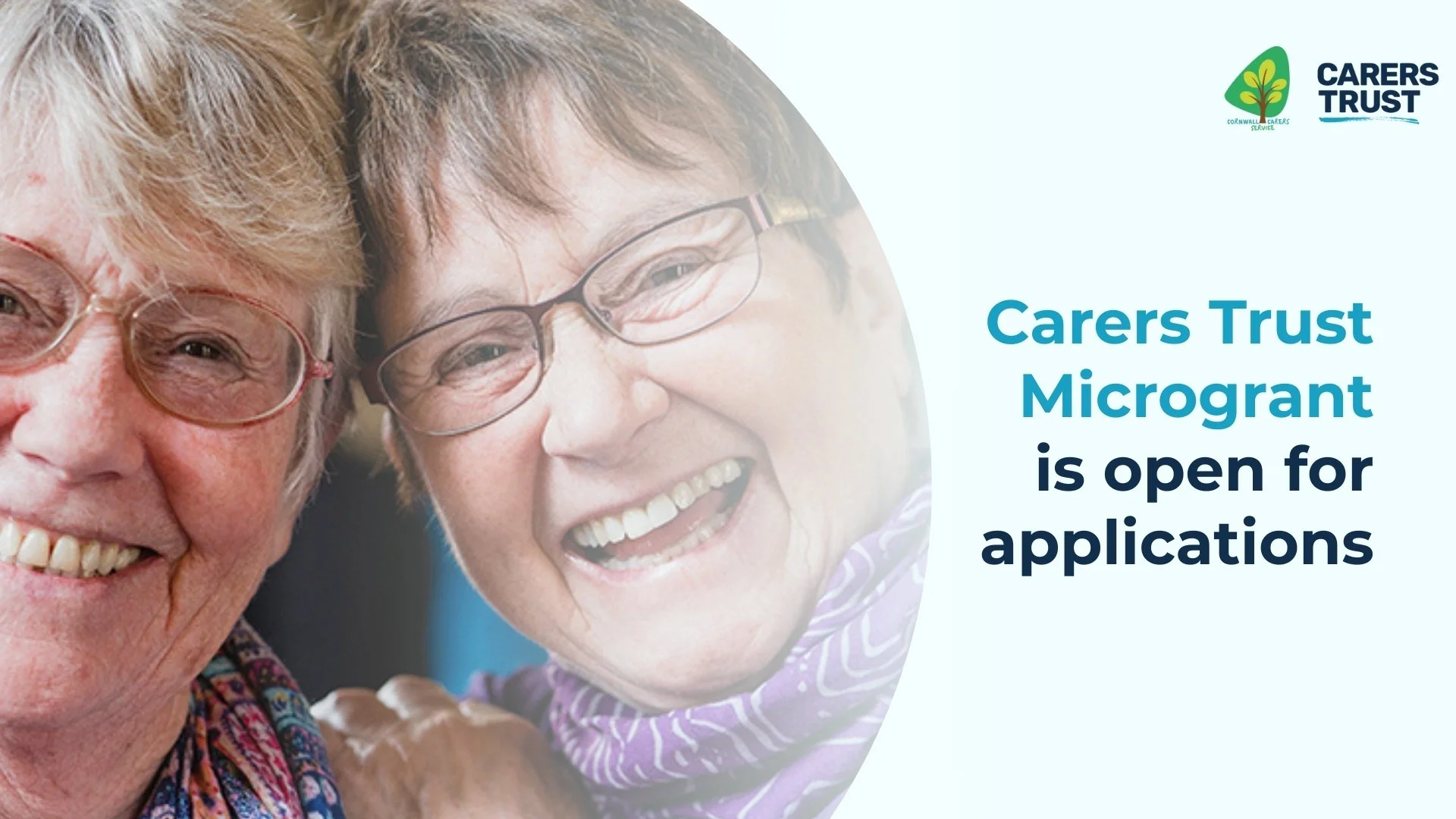 Old couple reading a book together outdoors.