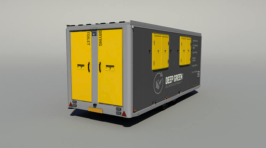 A mobile trailer with yellow compartments labeled for toilet and drying, marked with Deep Green branding.