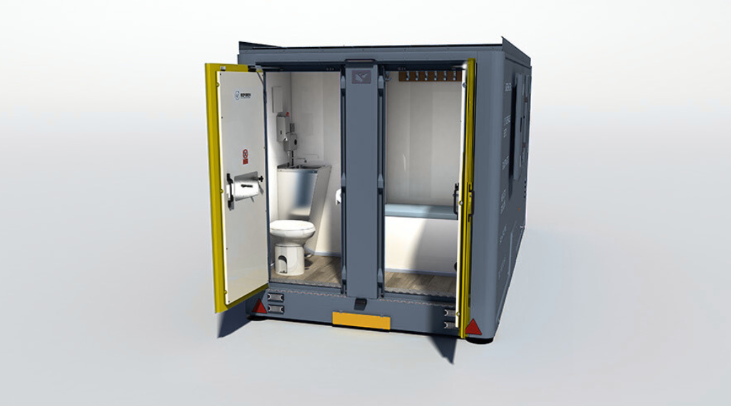 Portable restroom with a restroom facility with a toilet and sink inside.