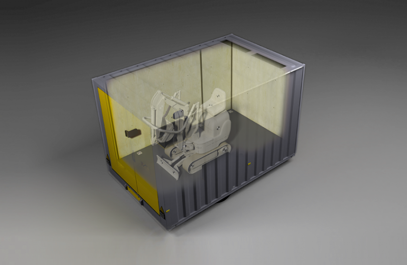 A robotic arm inside a transparent shipping container.