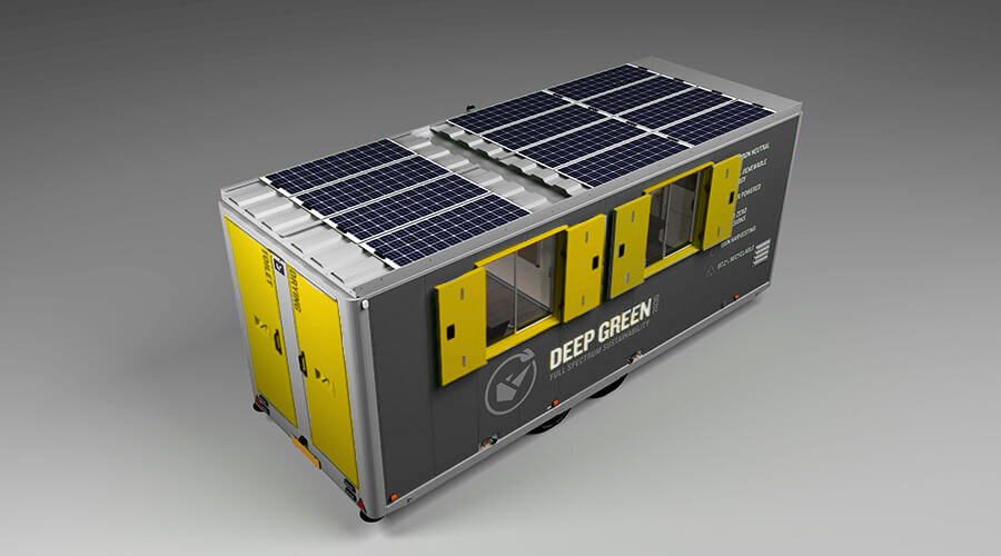 A modular portable unit with solar panels on top and yellow panels on the side, labeled Deep Green.