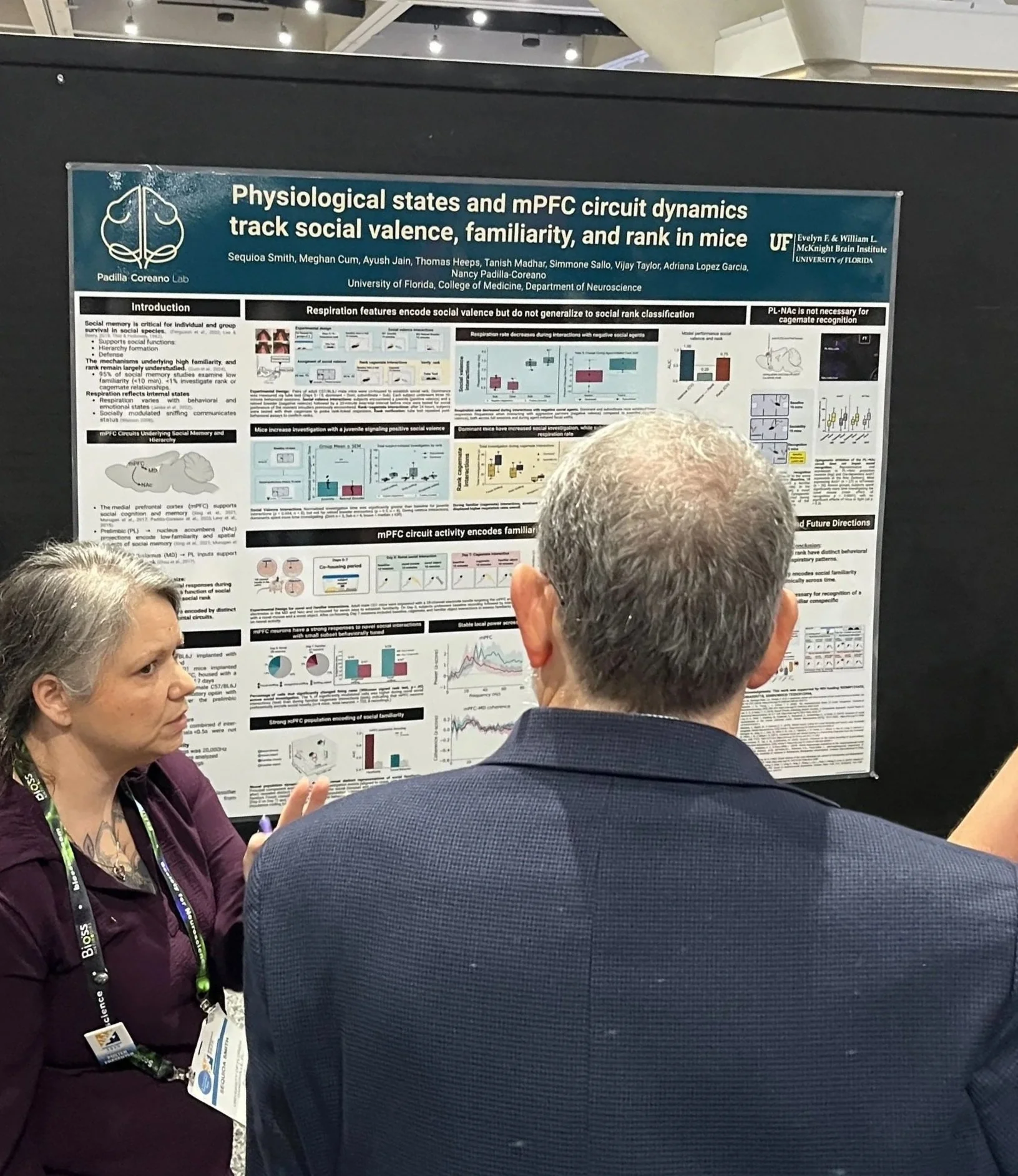 Sequioa discussing with audience her poster on physiological states and mPFC circuit dynamics across social valence, familiarity, and rank in mice at SfN