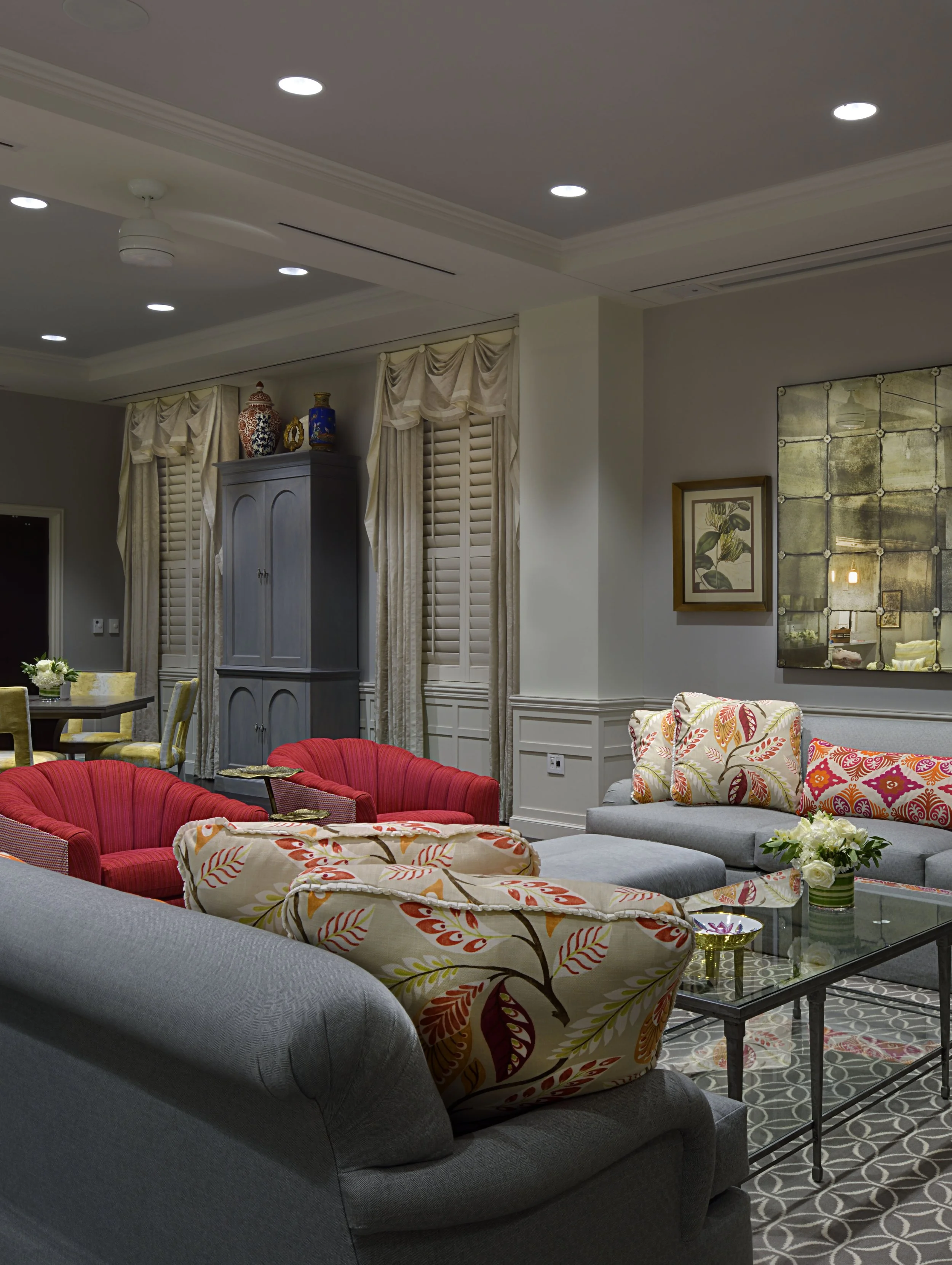 St-University_Sorority_House_Image8_Red-pink chairs area.jpg