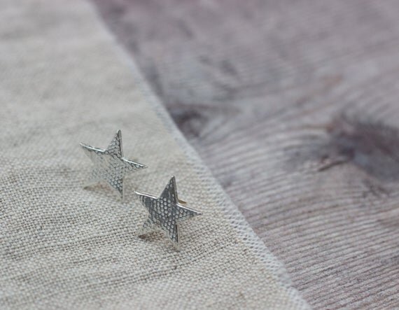 silver textured star stud earrings