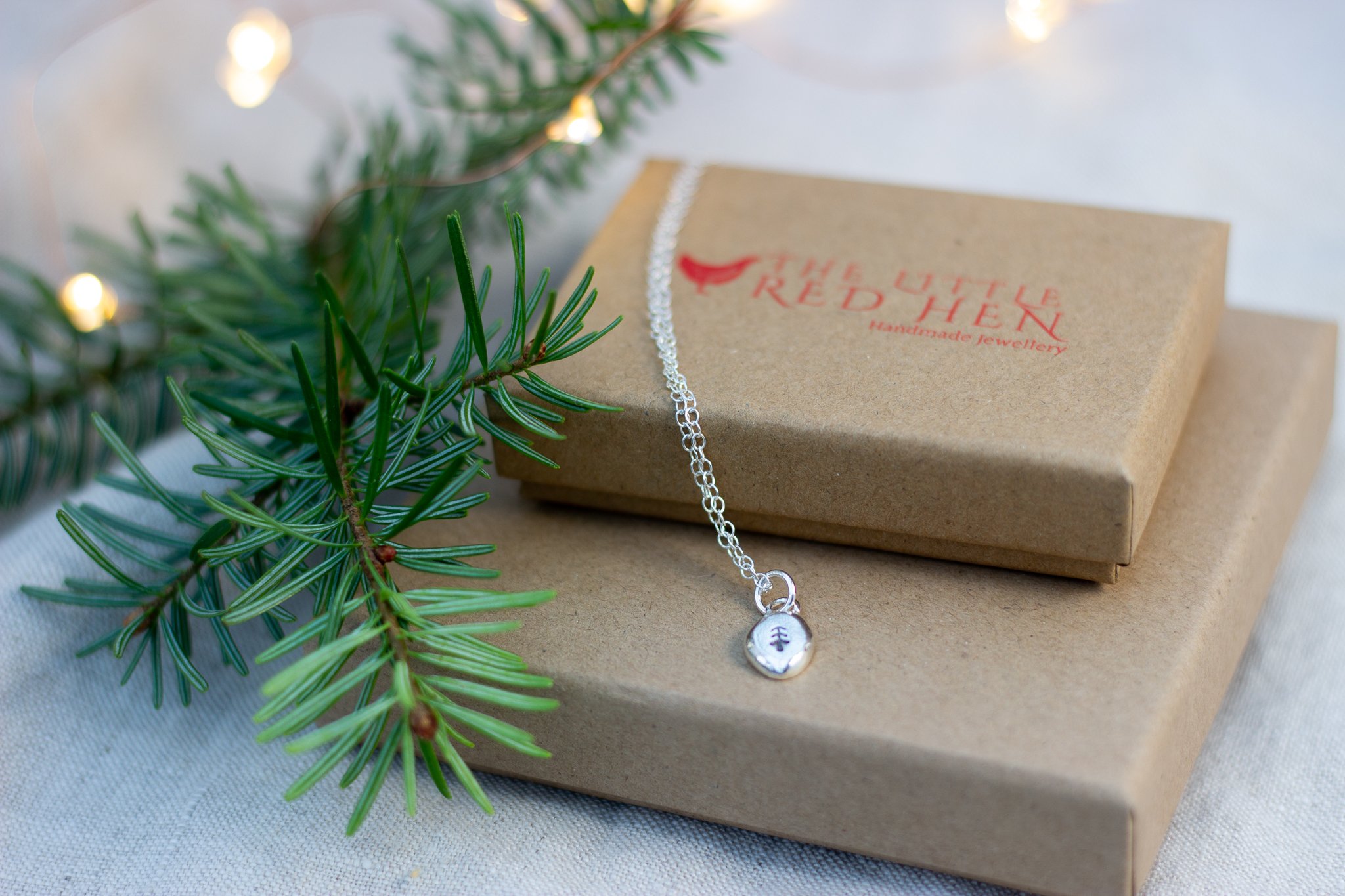 The Little Red Hen recycled silver nugget pendant with tree motif .jpg