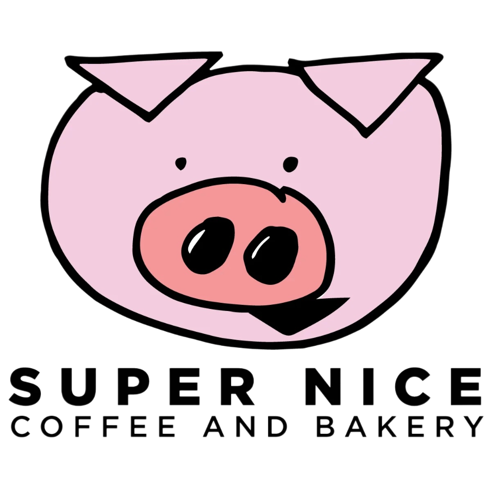 A cartoon pig face with pink skin, black eyes, and a pink snout, with two small ears on top, above the words "SUPER NICE COFFEE AND BAKERY".