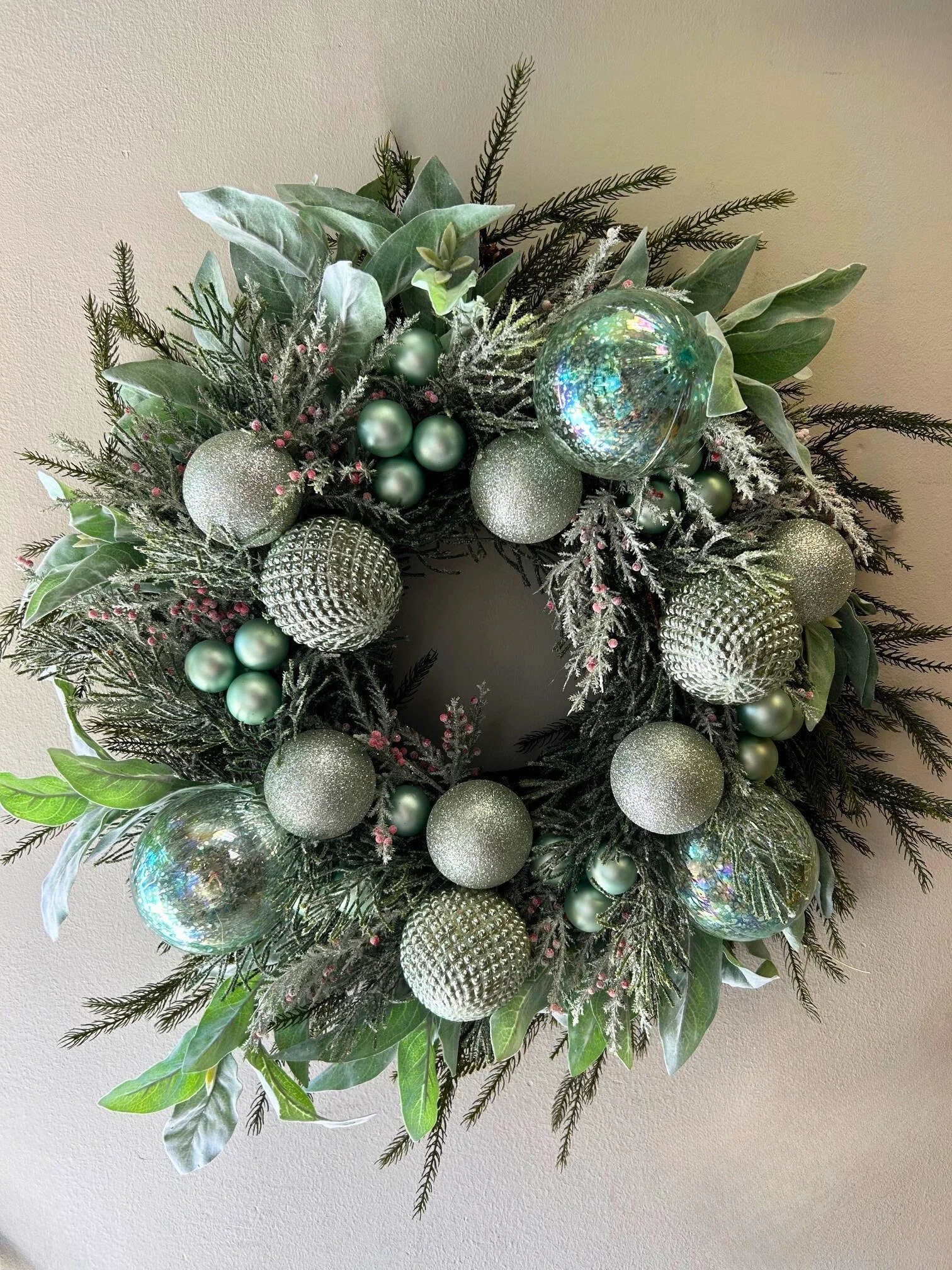 24" Pine and silver and blue ball wreath
$425
Pair available