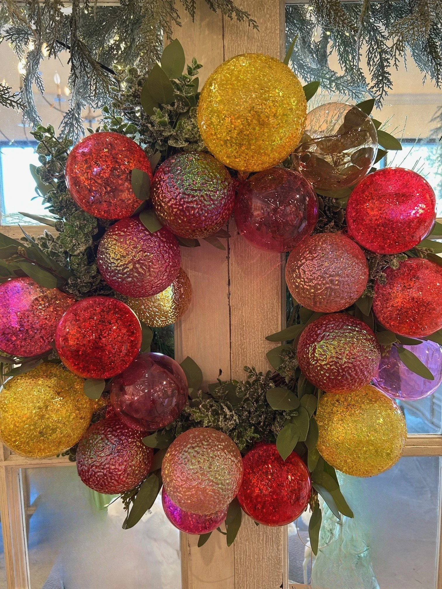 24" Frosted eucalyptus and multi ball wreath
$515
Pair available