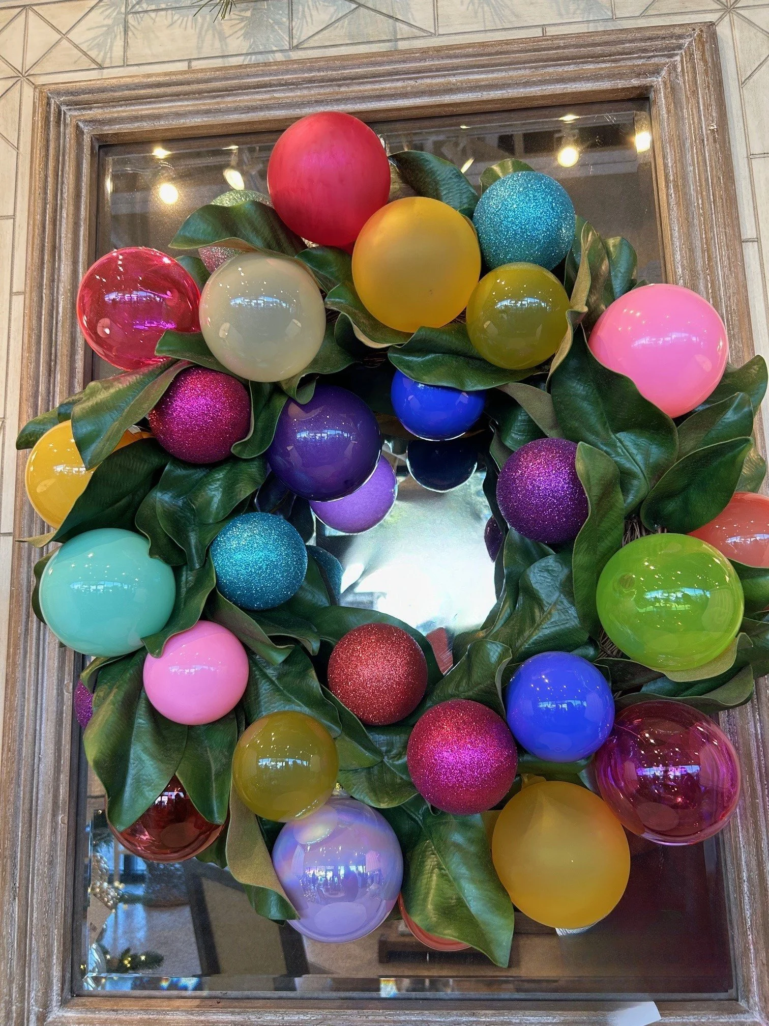 26" Green magnolia with multi balls wreath
$480