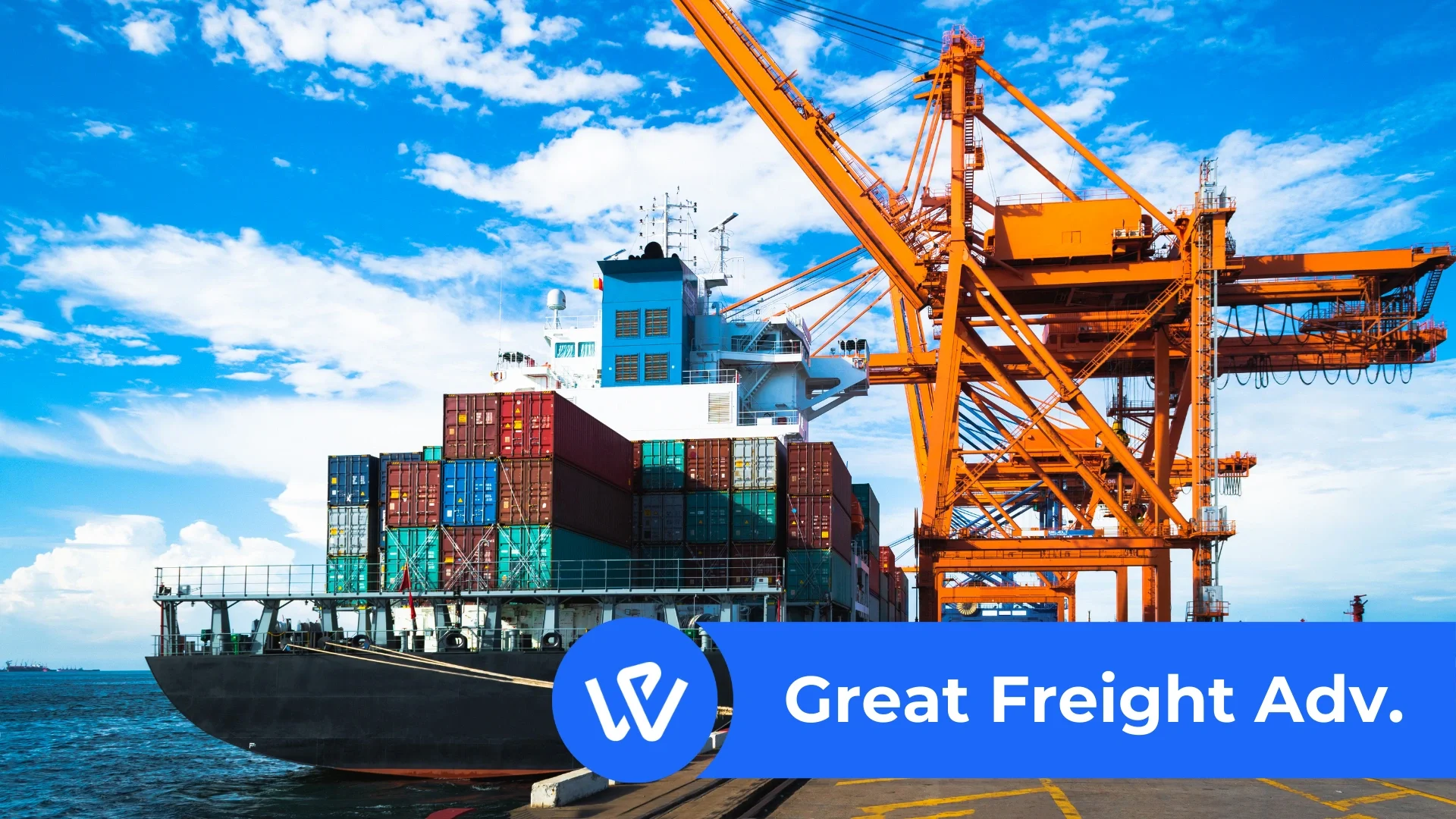 Barge with shipping containers loaded by a yellow crane