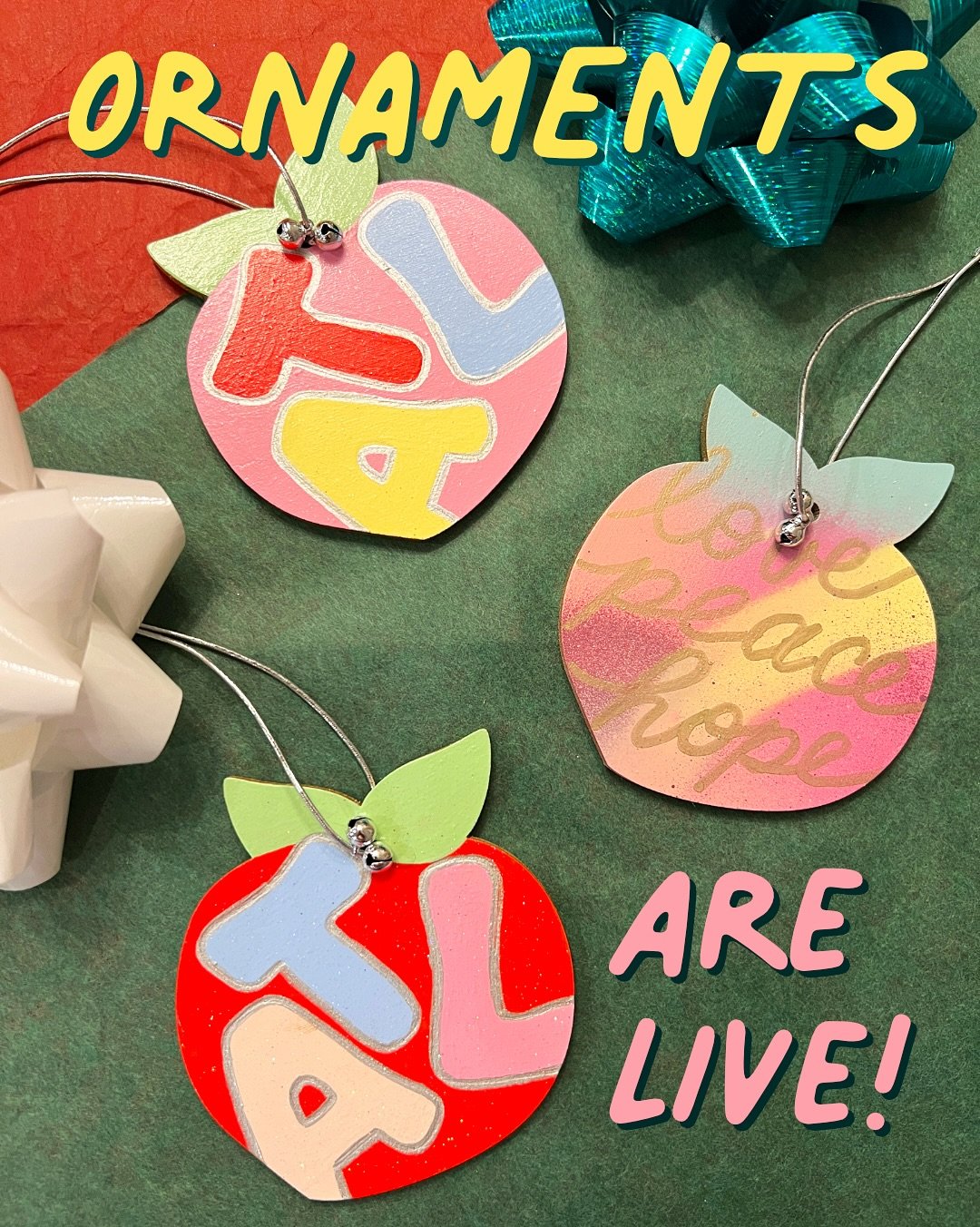 My peachy ornaments are live on my website! You can also buy in person soon at Cat Eye Creative and my open studio on Dec. 20th. 

Pick from 3 styles: Pink ATL, Red ATL, and Multicolor Love Peace Hope! Cones with a silver string and two silver bells 