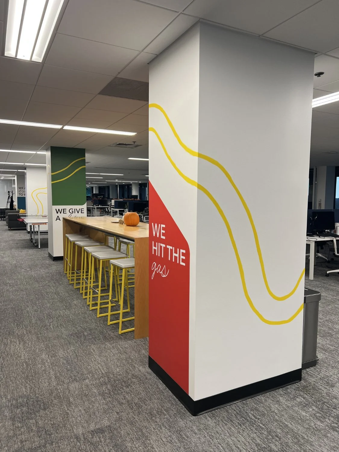 Colorful columns with branded core values for an interior office client.