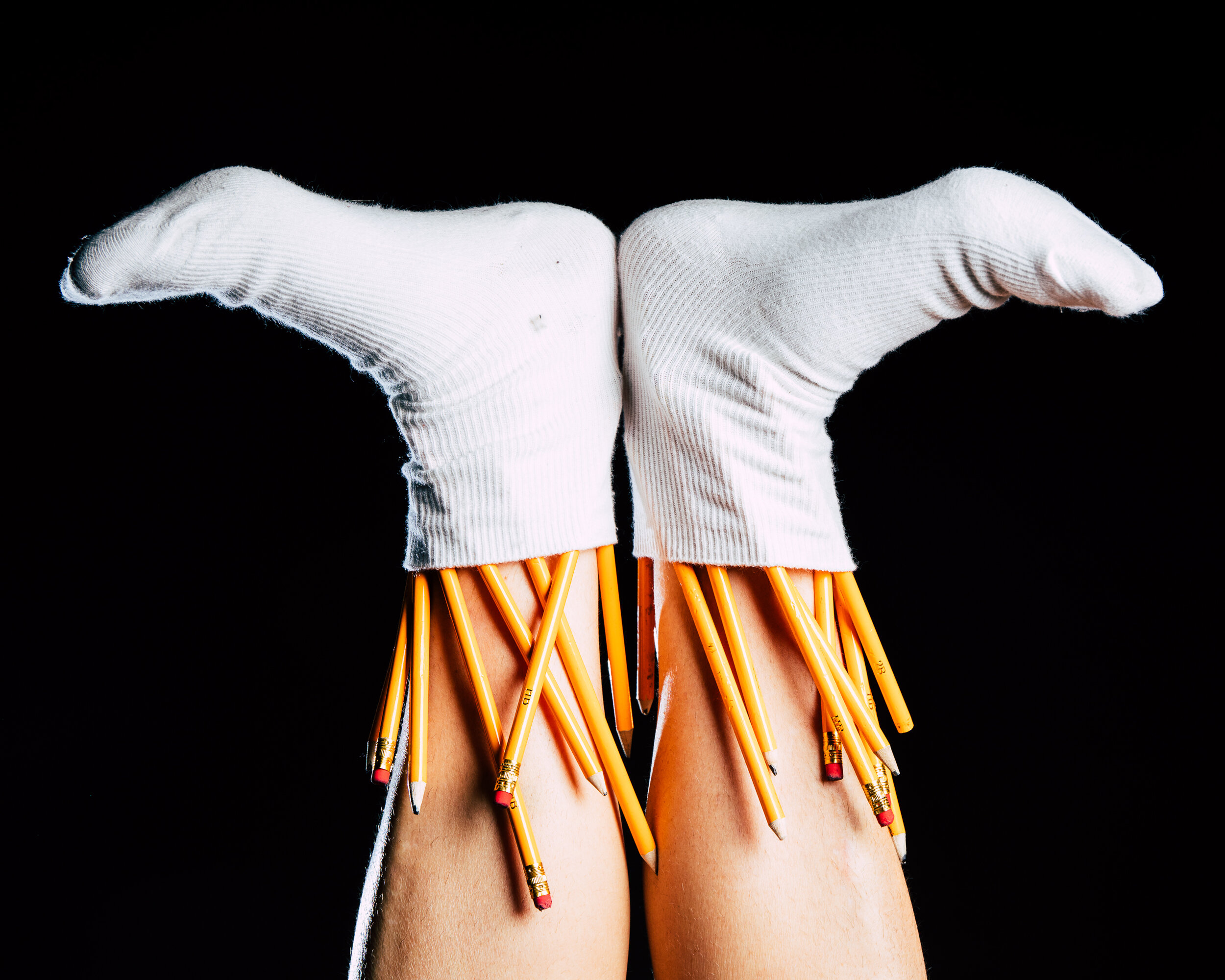 Handstand feet photo with pencils The Thesis
Photo by DaVincie Photography
