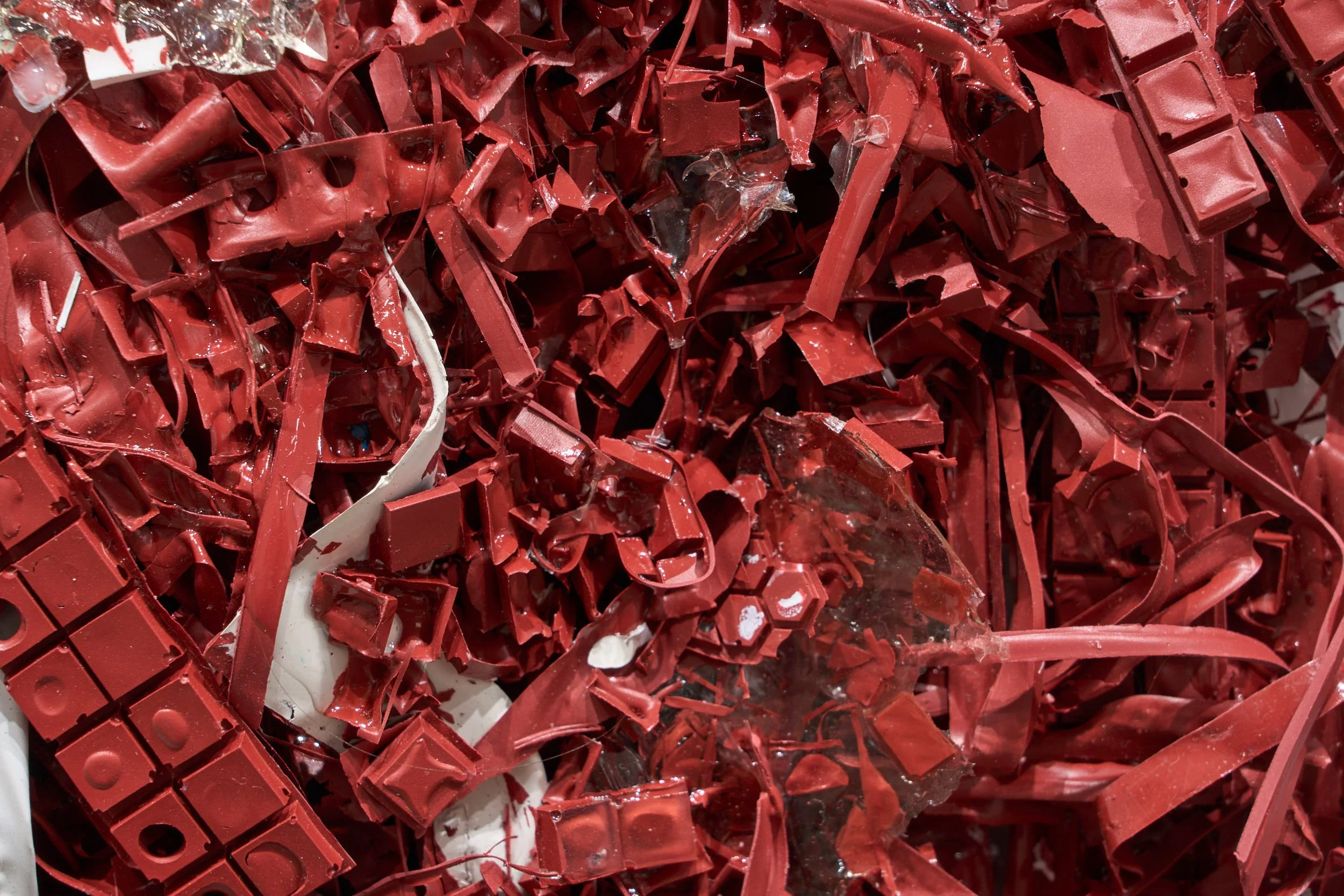 Close-up of a pile of cast paint remnant pieces. 