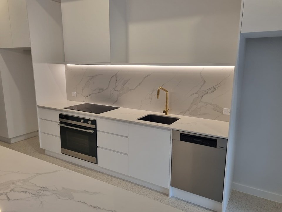 Gold tap kitchen.jpg