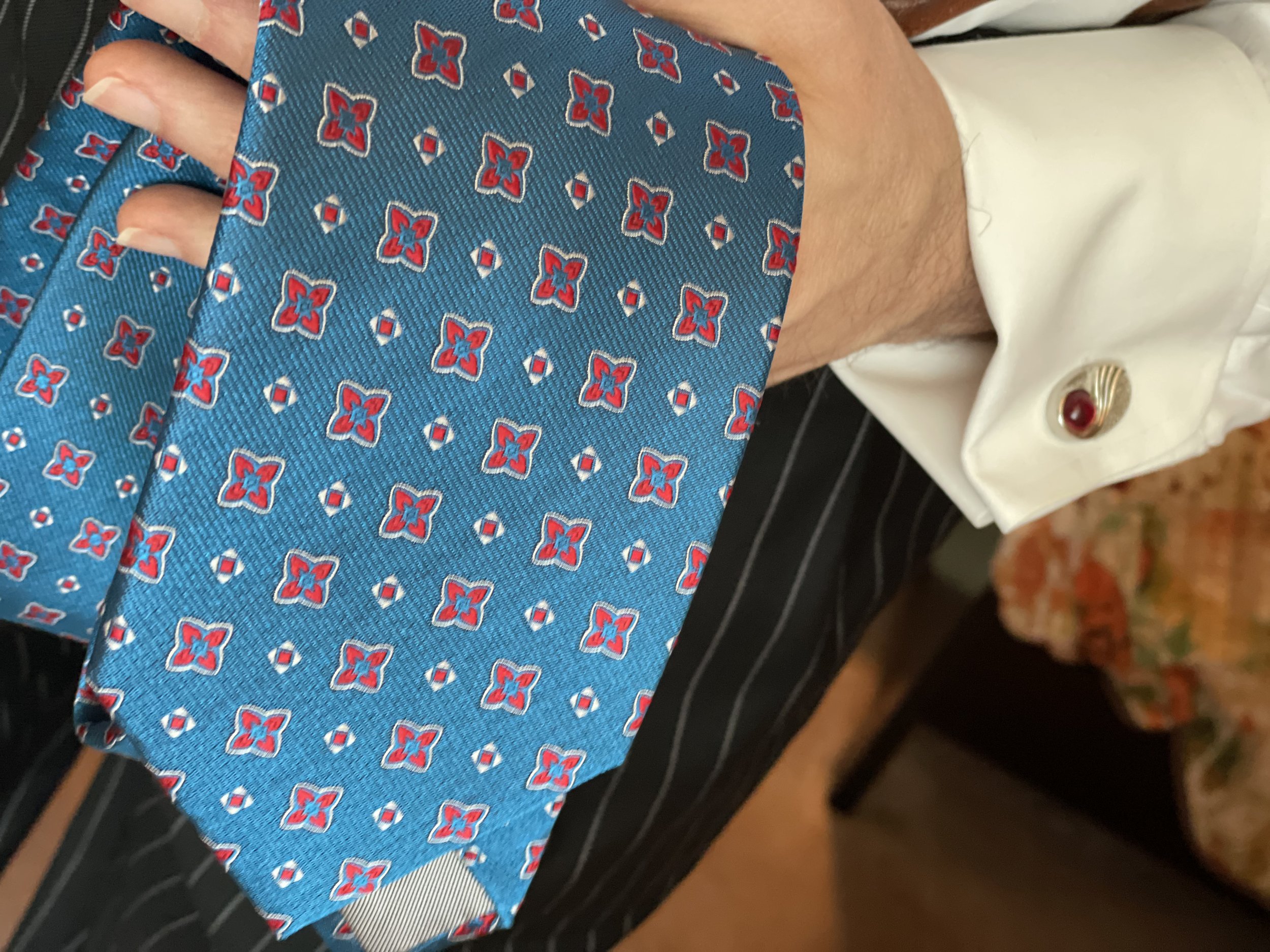 This is a London York necktie, known for thick luxurious silk, executive power stylings, and bigger tie knots.