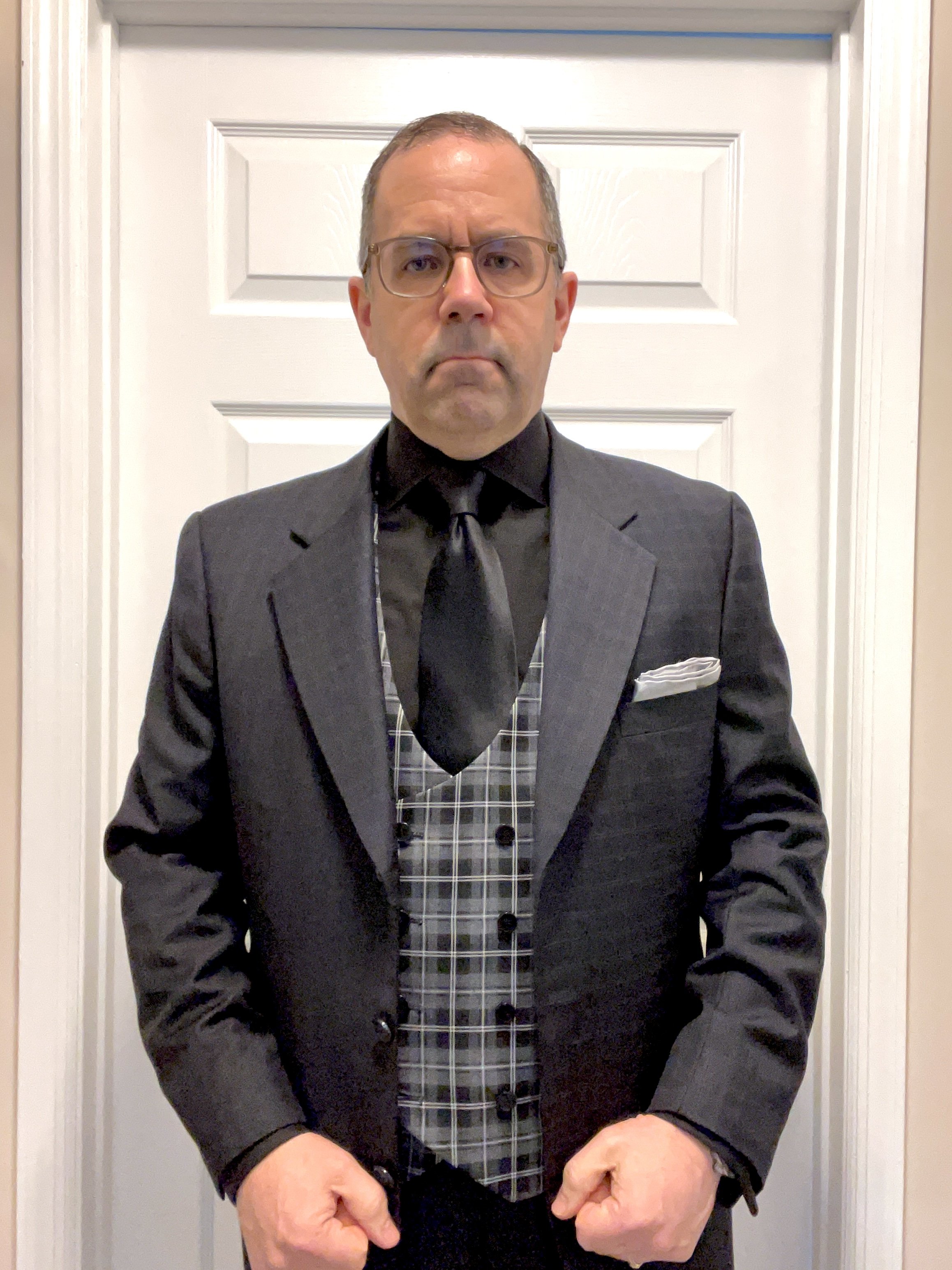 The final outfit image - a silver and black tapestry.
