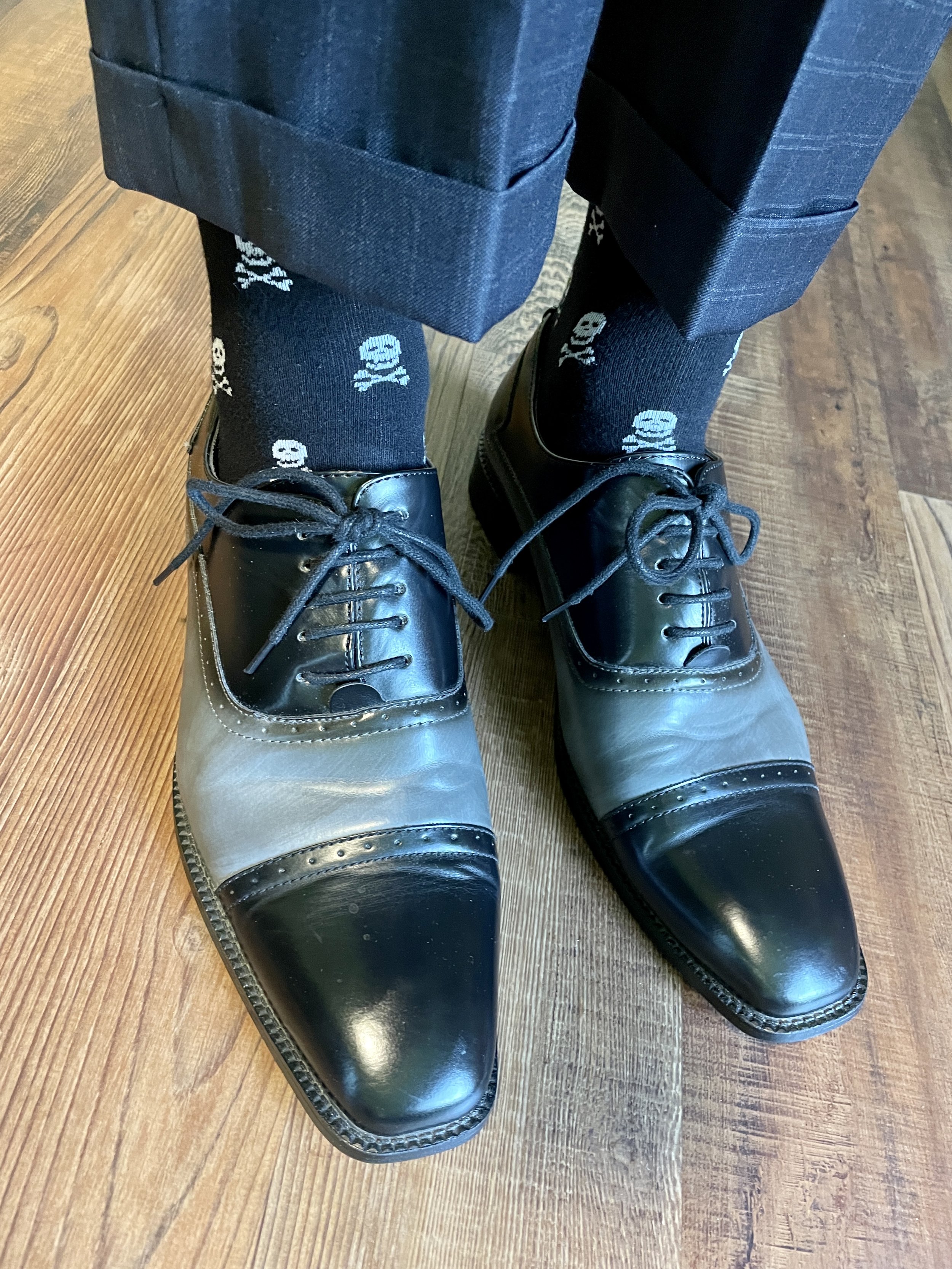 Even two toned shoes to captures the two-toned outfit theme. And skulls always add a cool touch to anything!