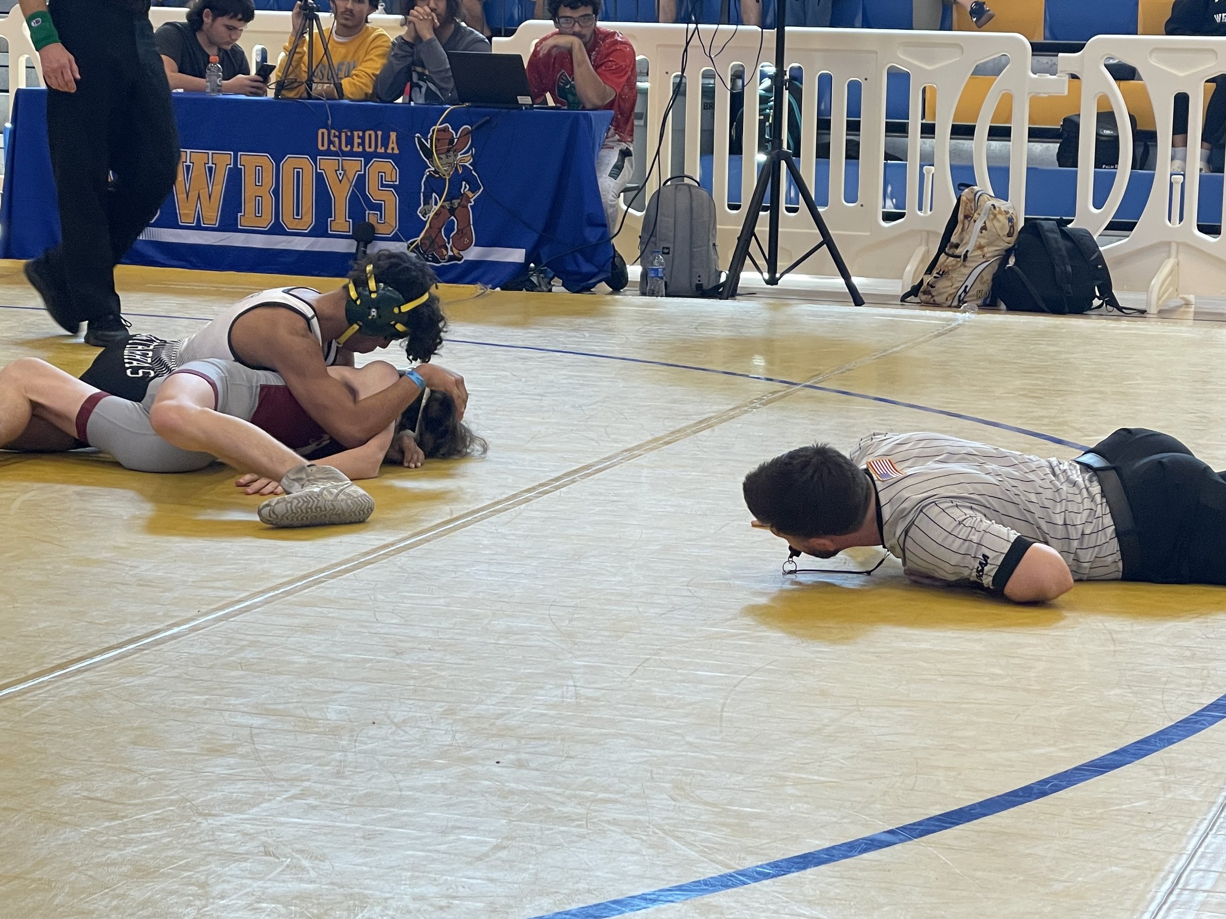 Suwannee builds big lead, earns region duals title