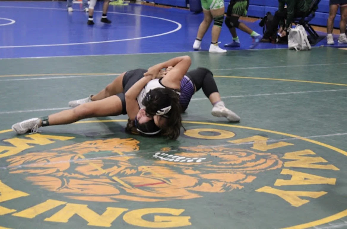 Today’s Featured Wrestler: Emily Pomar